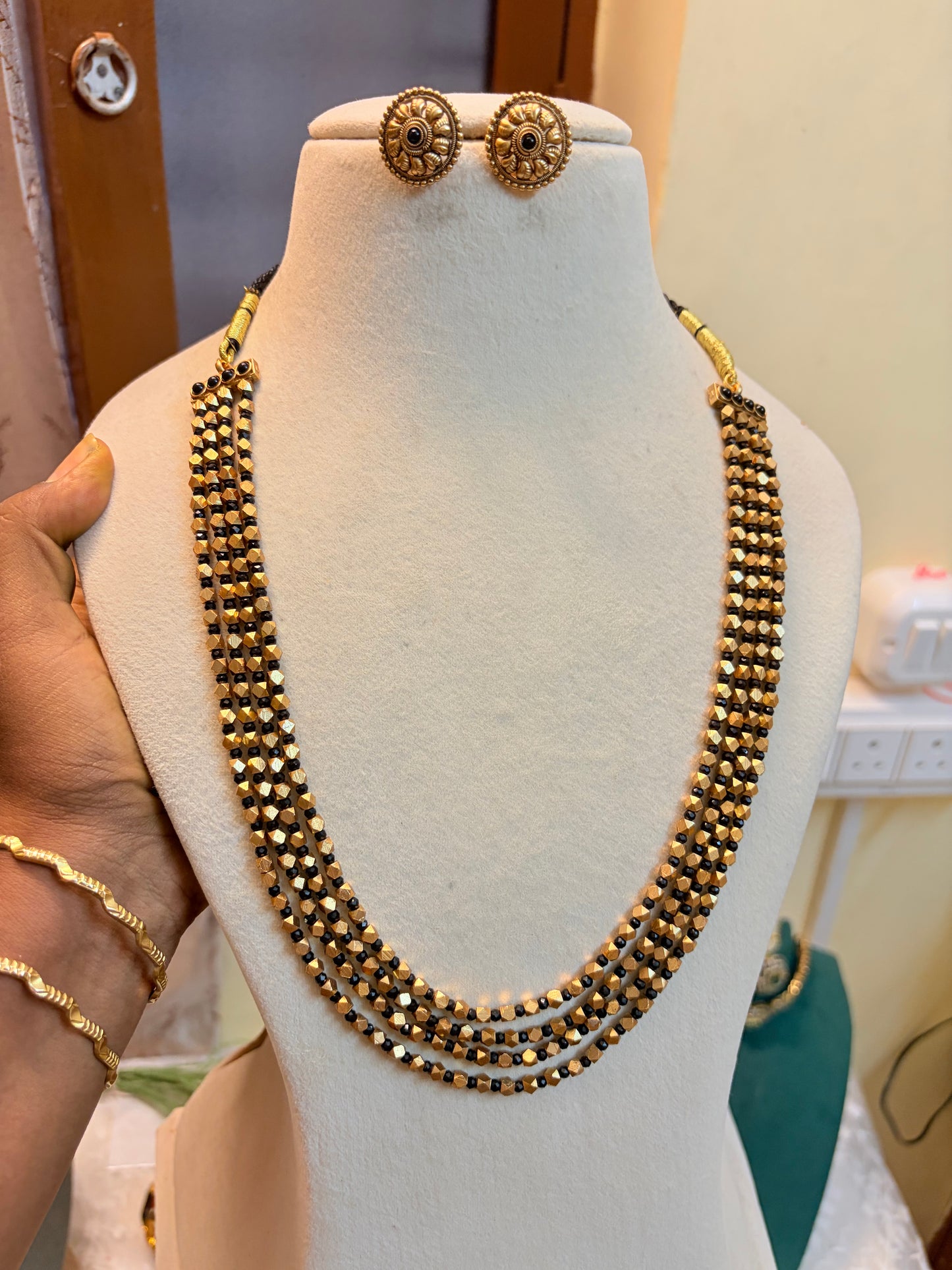 Golden gleam black beads haram