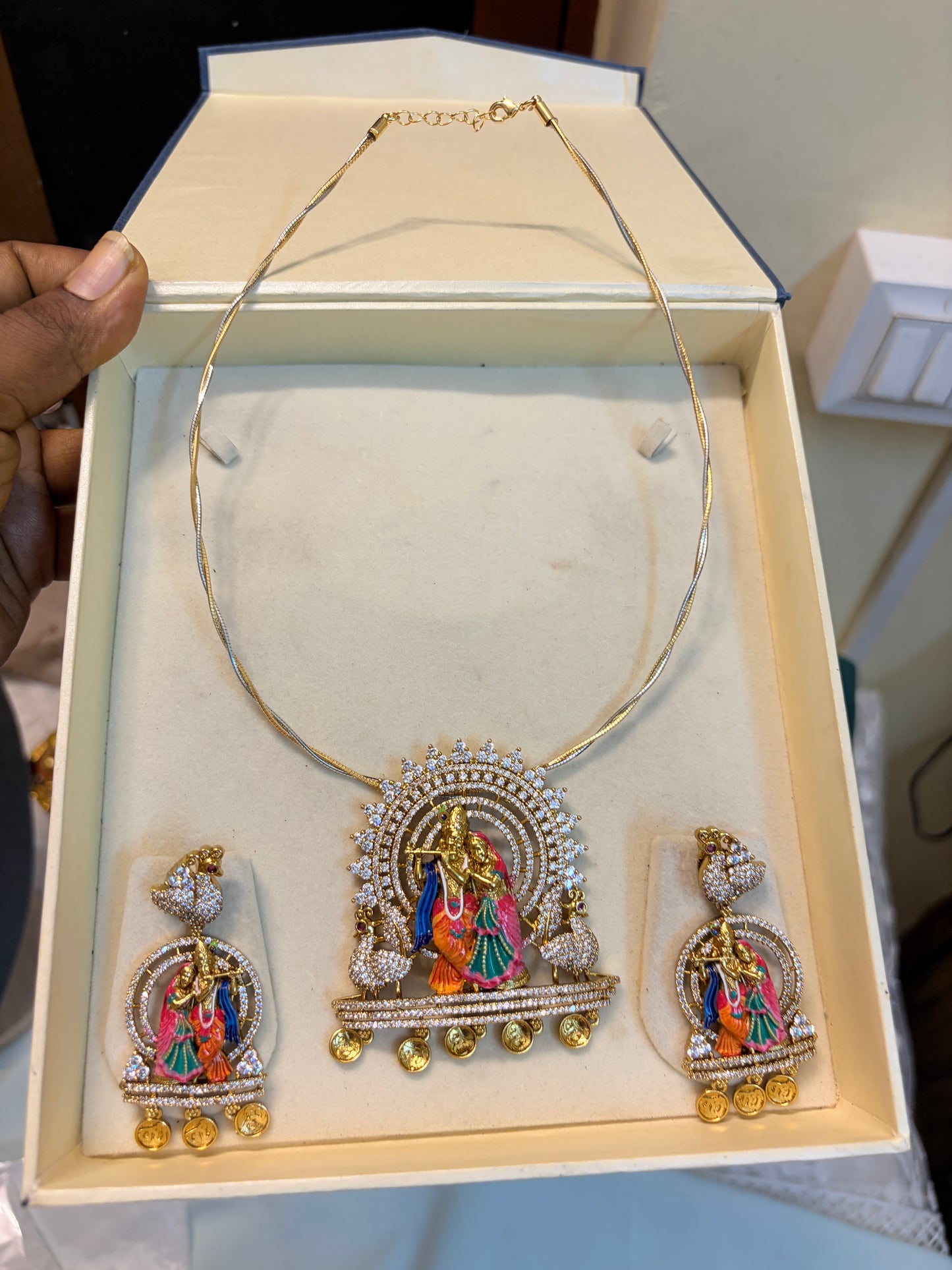Radha Krishna pendant with hasli chain
