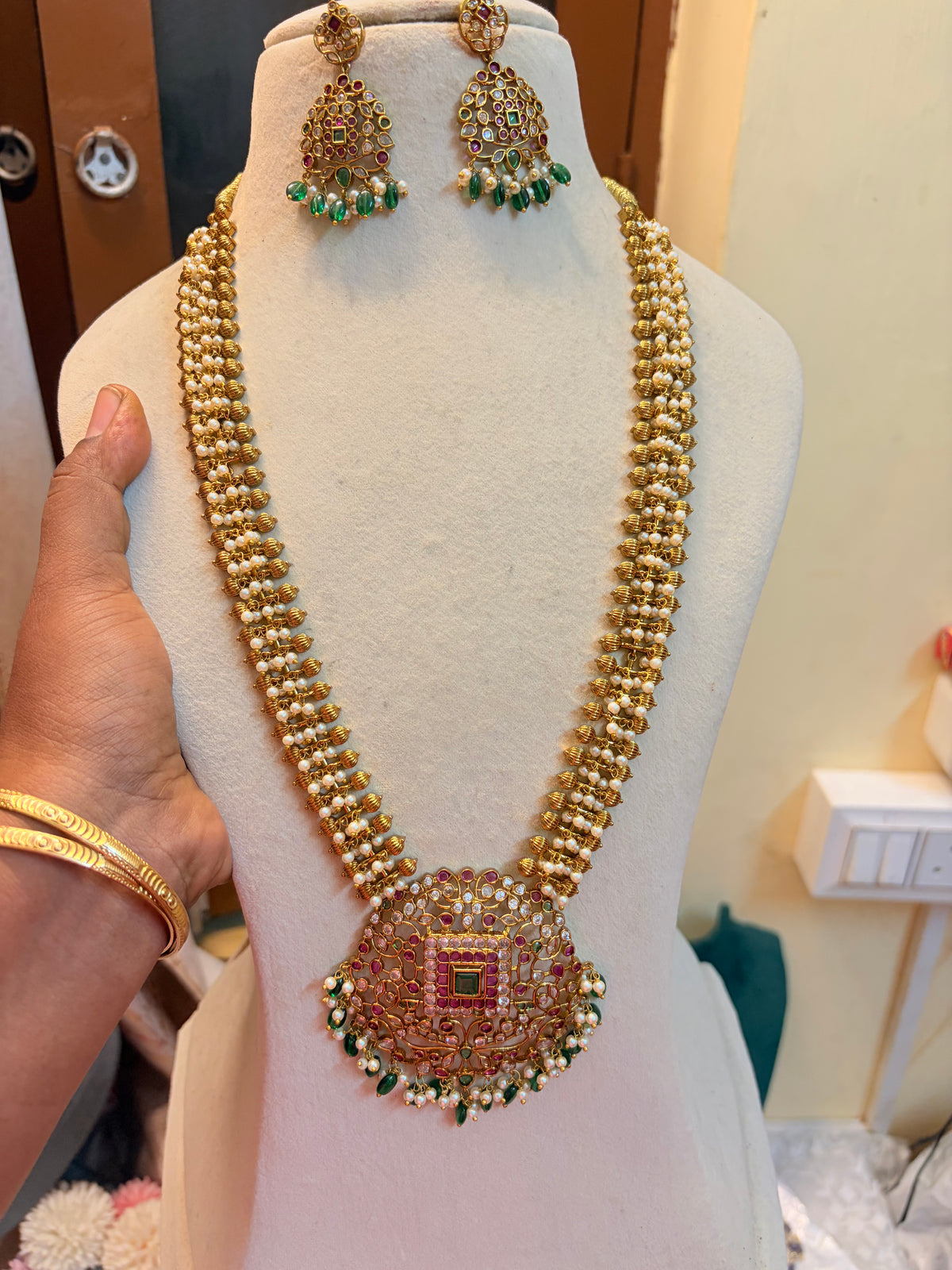 Antique Gold Finish Kundan Kemp Stone Pearl Beaded Long Haram with Statement Pendant & Matching Earrings