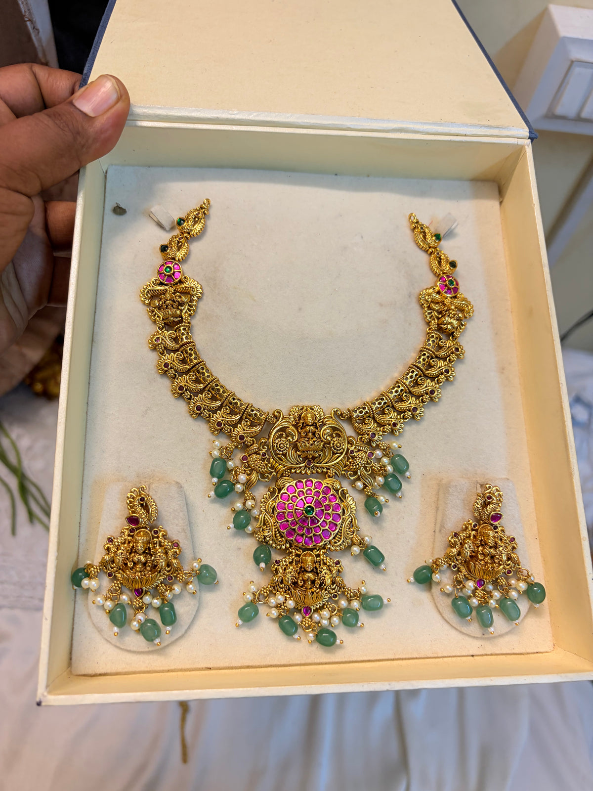 Pure kemp stones jadau Lakshmi motif necklace set