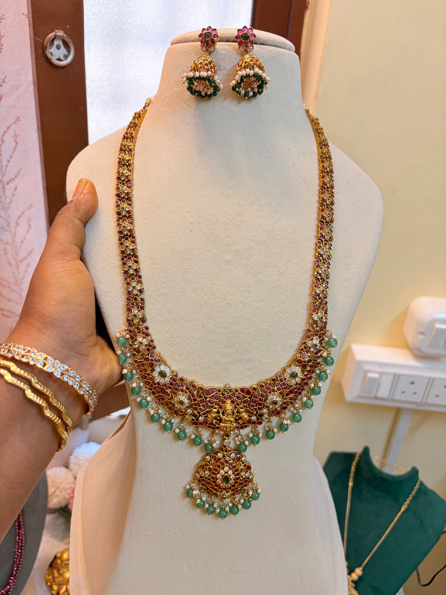 Lakshmi Kemp stones jadau haram with emerald beads accents