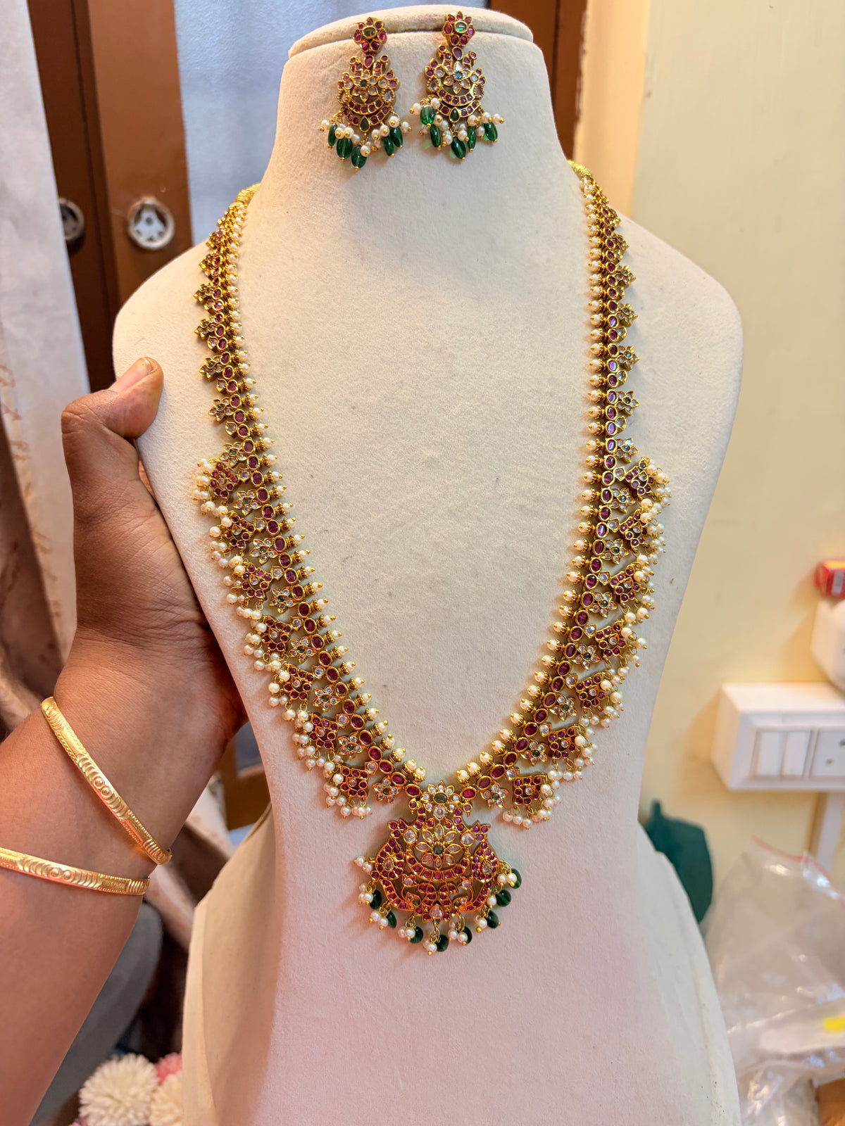 Antique Gold Finish Kemp Stone Floral Haram with Pearl & Green Bead Drops and Matching Earrings