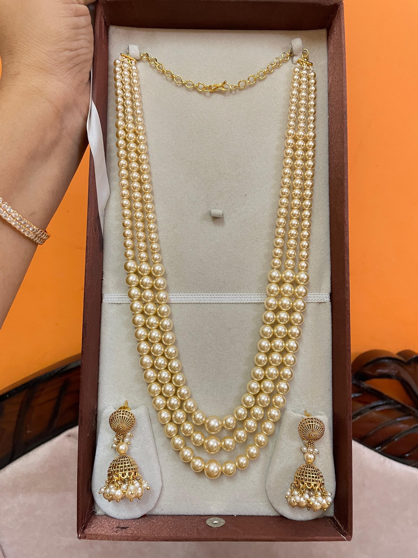 3 layer Swarovski pearls with earrings 22 to 24 inches