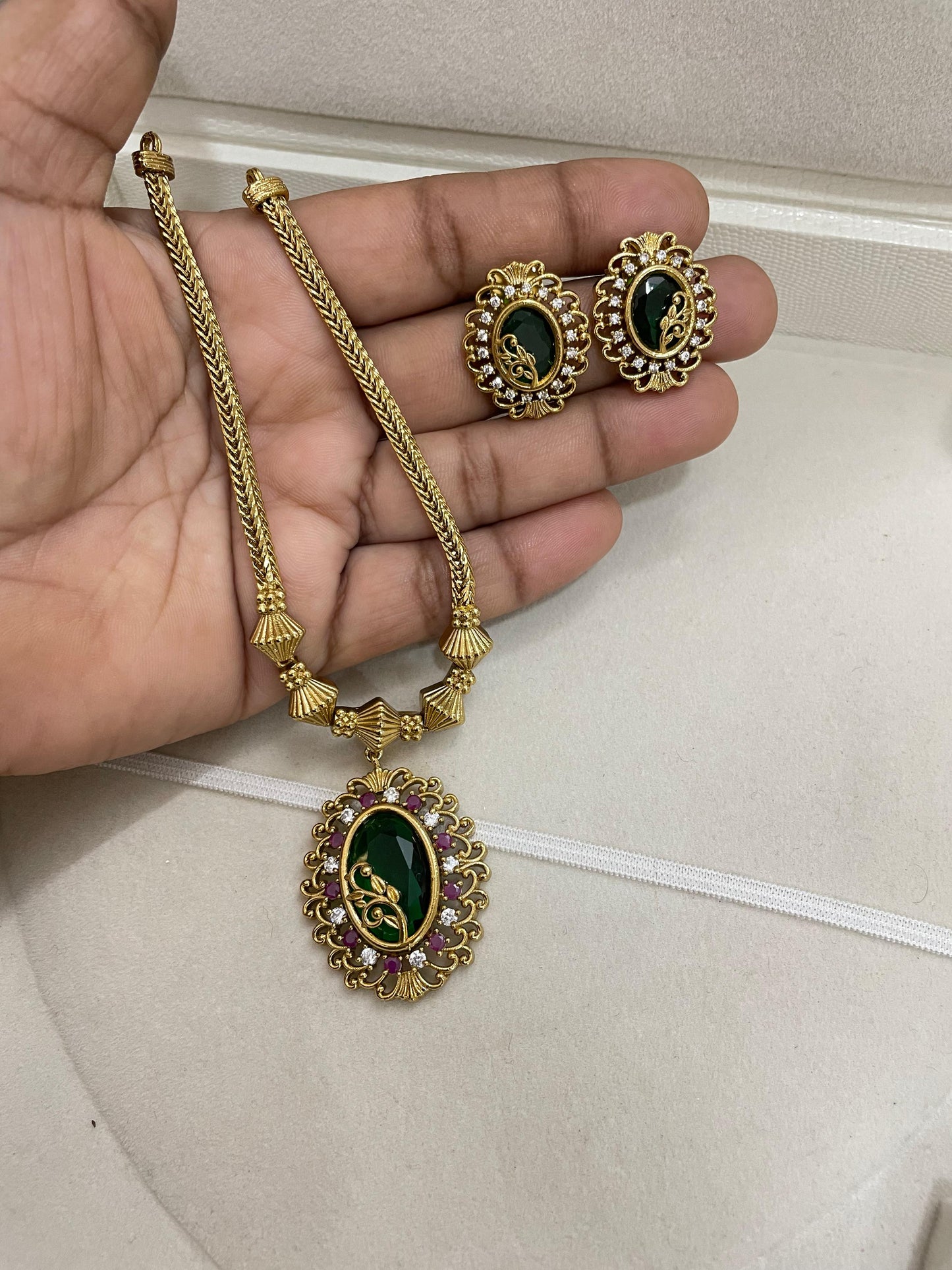 Regal emerald gold antique finish necklace set