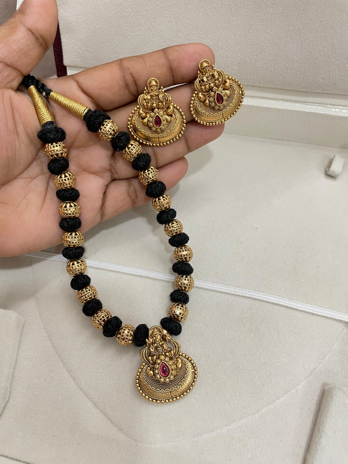 Heritage inspired black dori lakshmi pendant necklace set