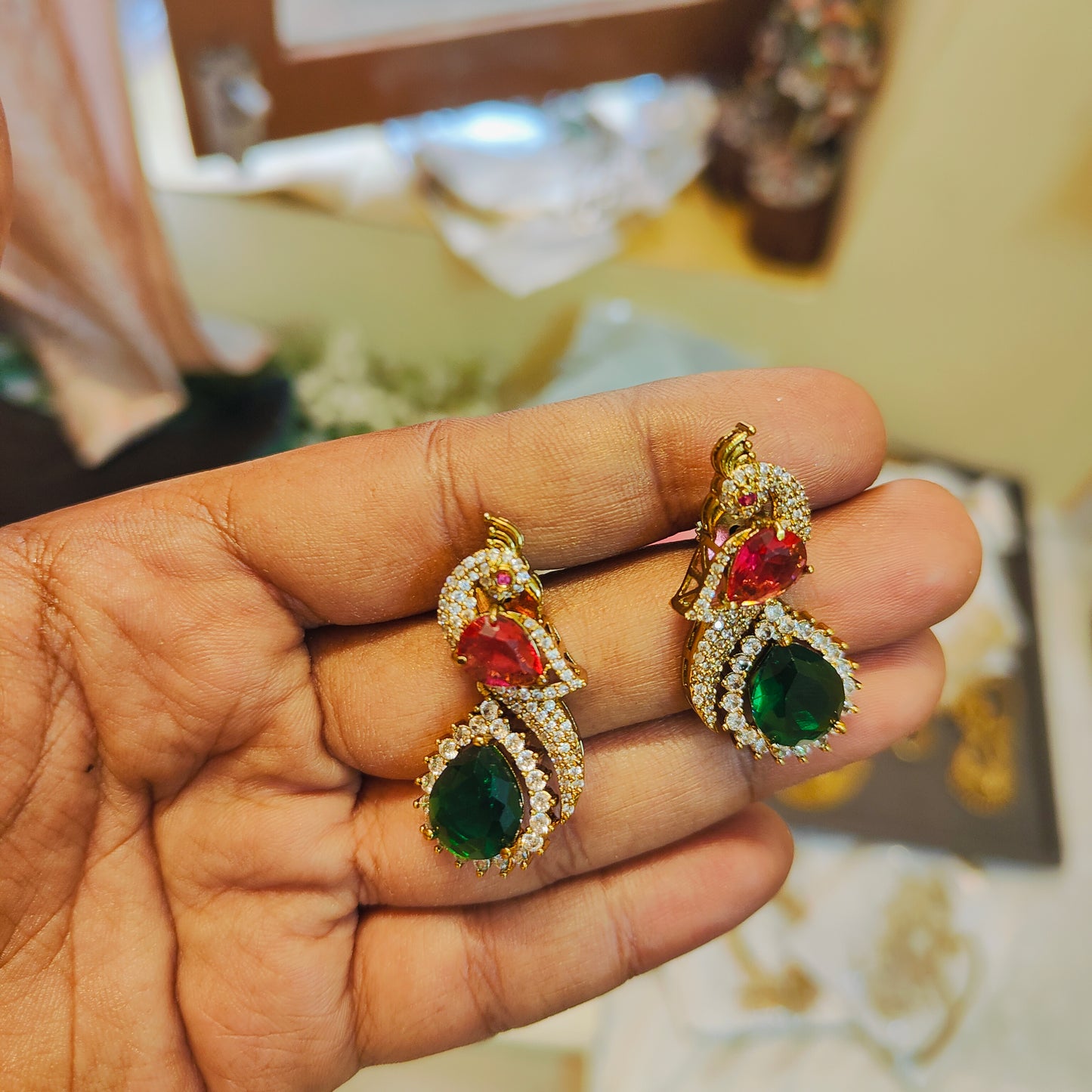 Regal peacock sparkle earrings