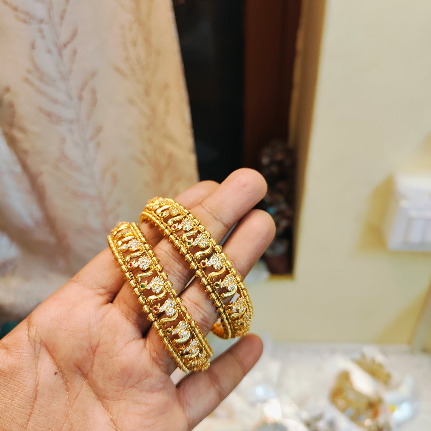 Golden grace peacock bangles