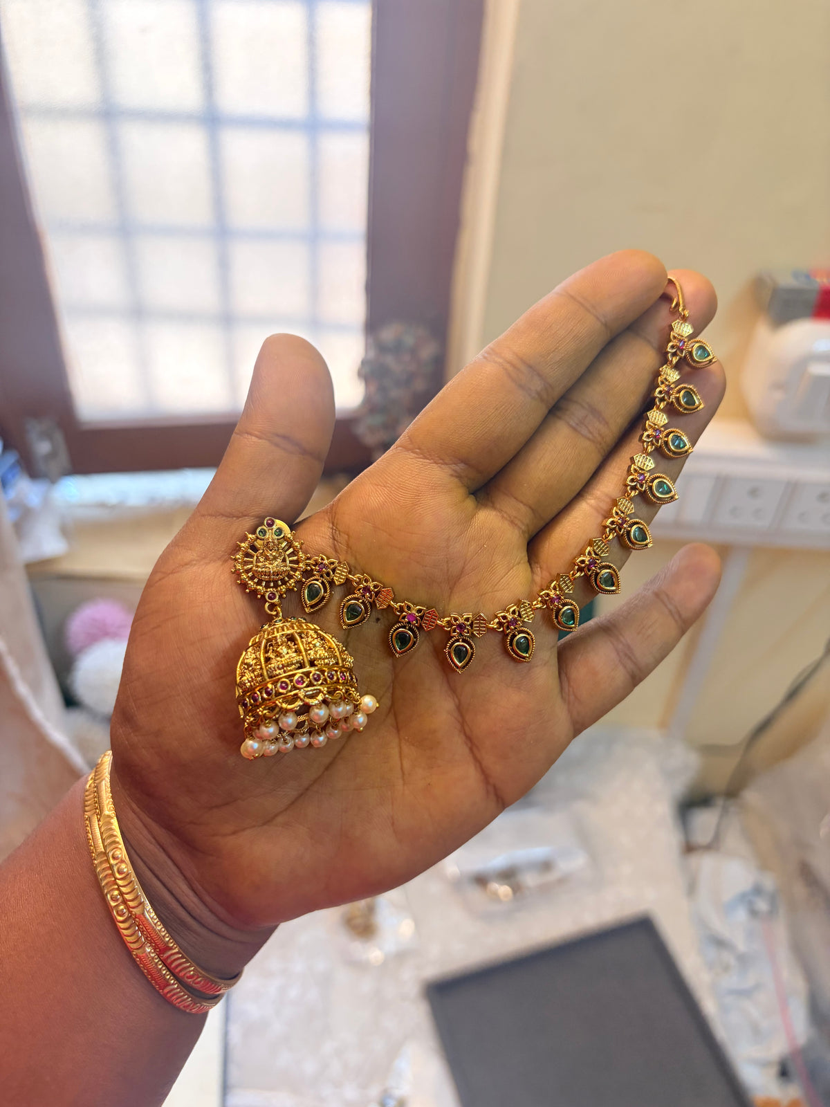 Gold antique finish earrings with earchain attached