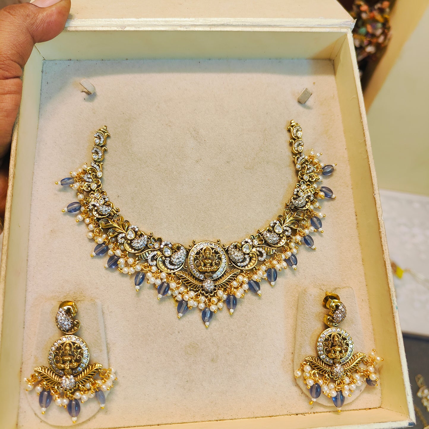 Royal peacock motif antique set with purple accents