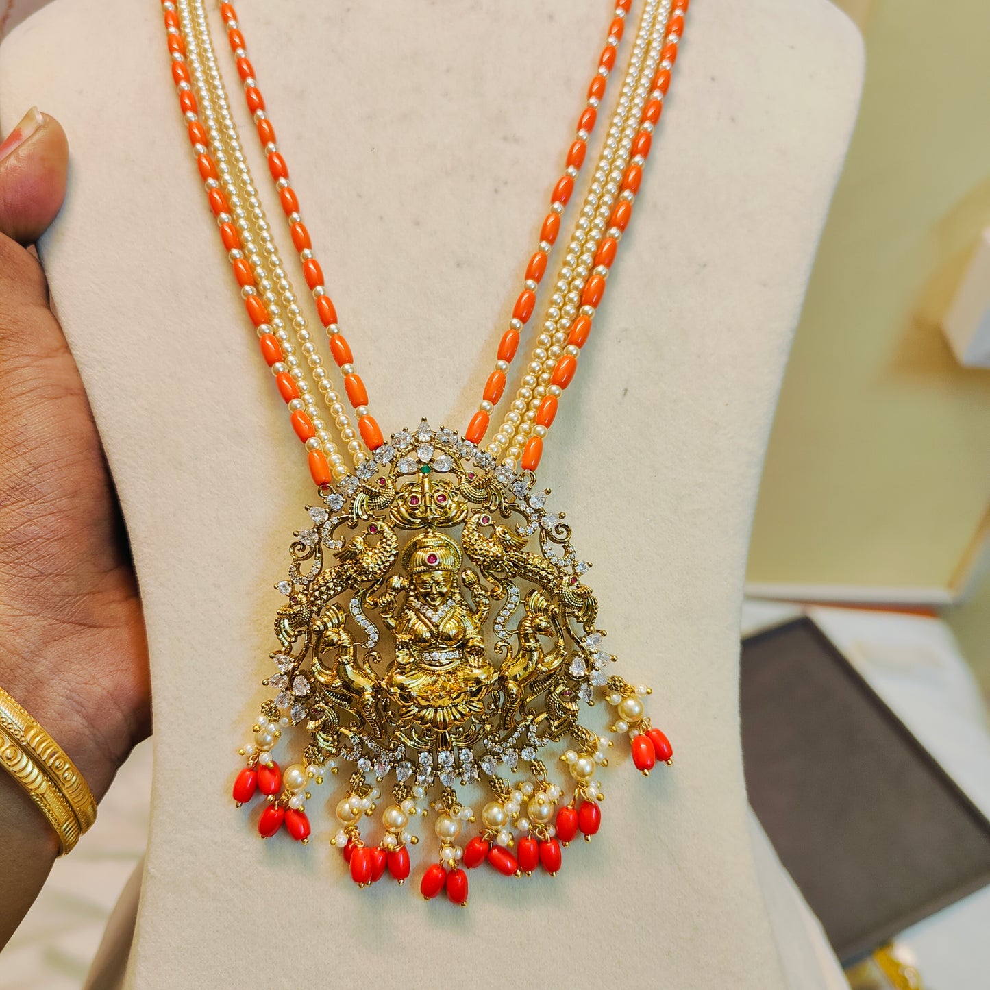 Lakshmi pendant coral beads haram