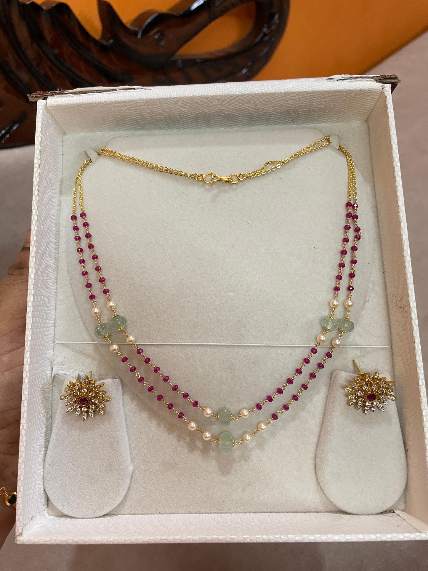 Dual layer ruby beads chain with floral stud