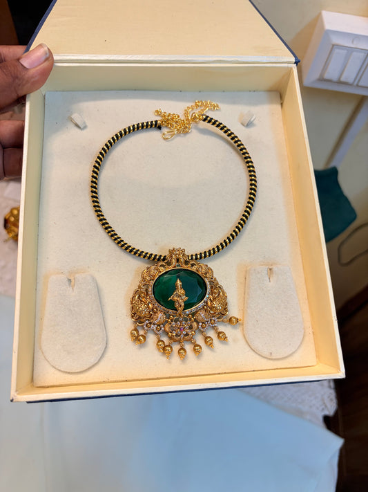 Emerald Krishna pendant with black Kanti