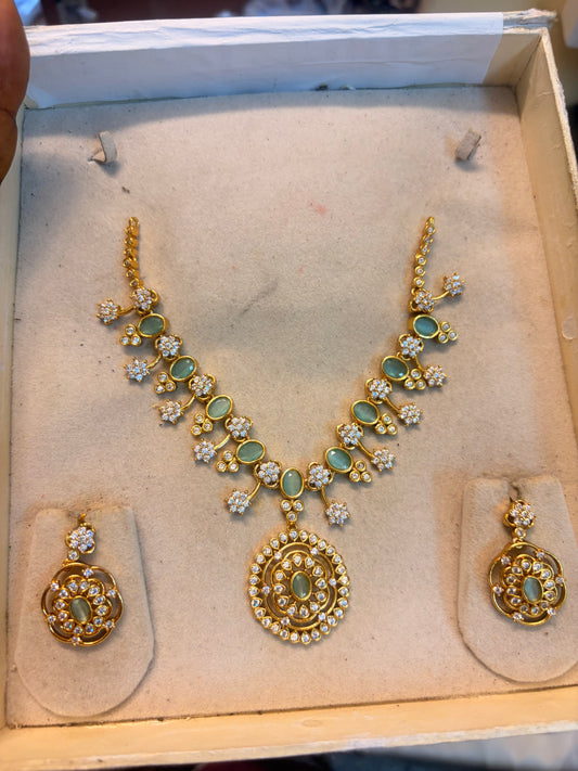 Aqua blue circular pendant necklace set