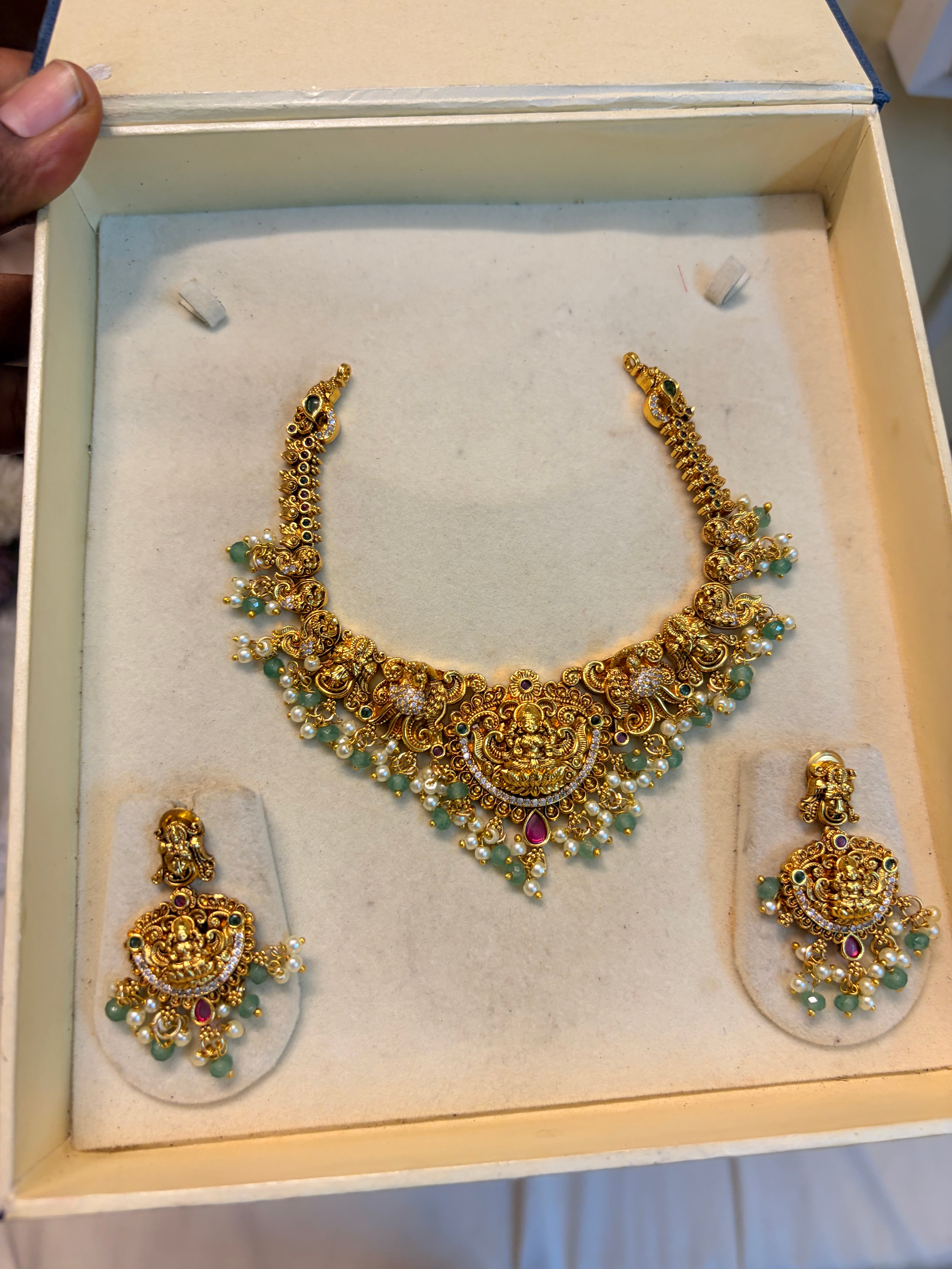 Gold Nakshi jadau necklace set with strawberry beads accents