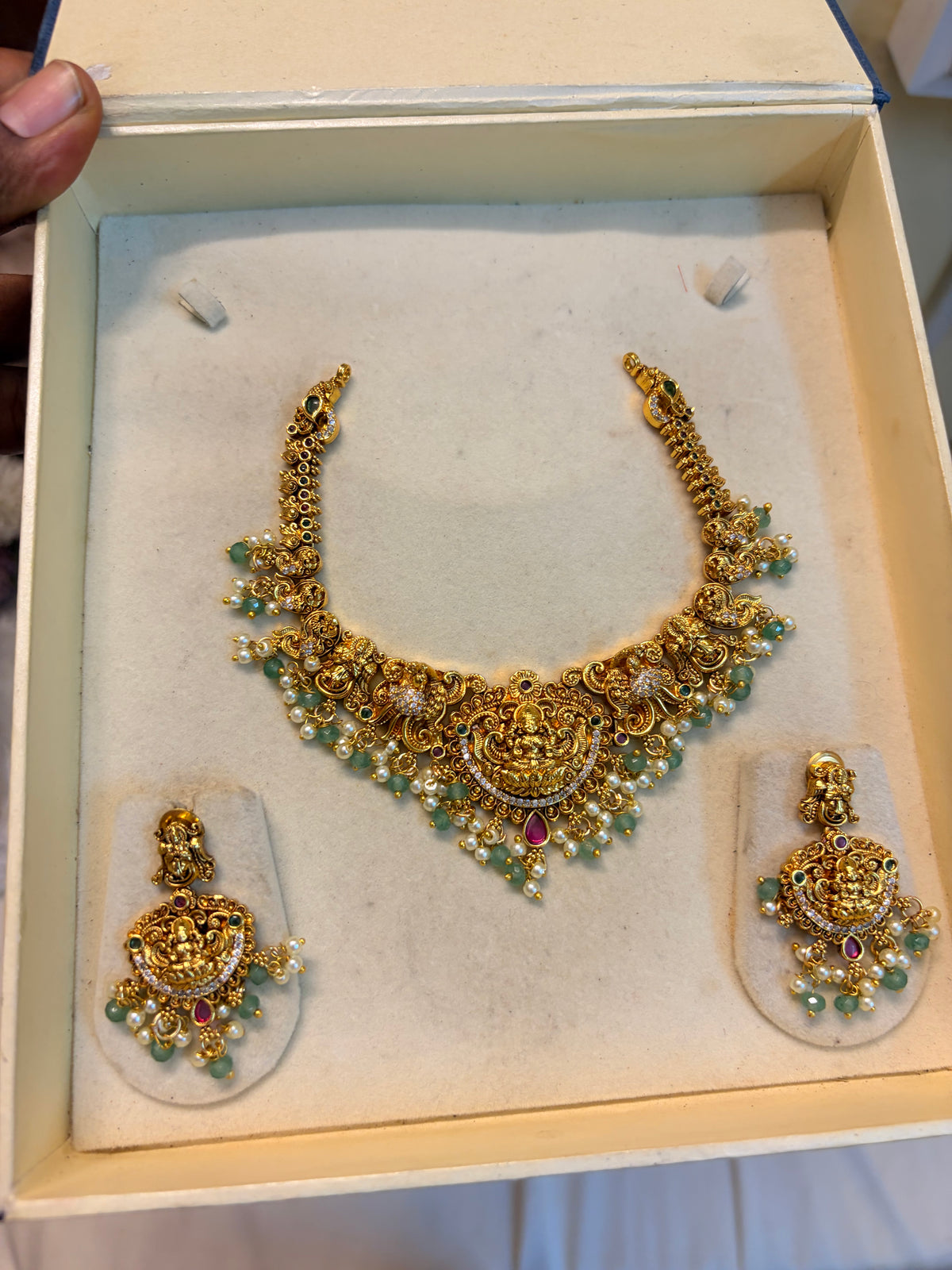 Gold Nakshi jadau necklace set with strawberry beads accents