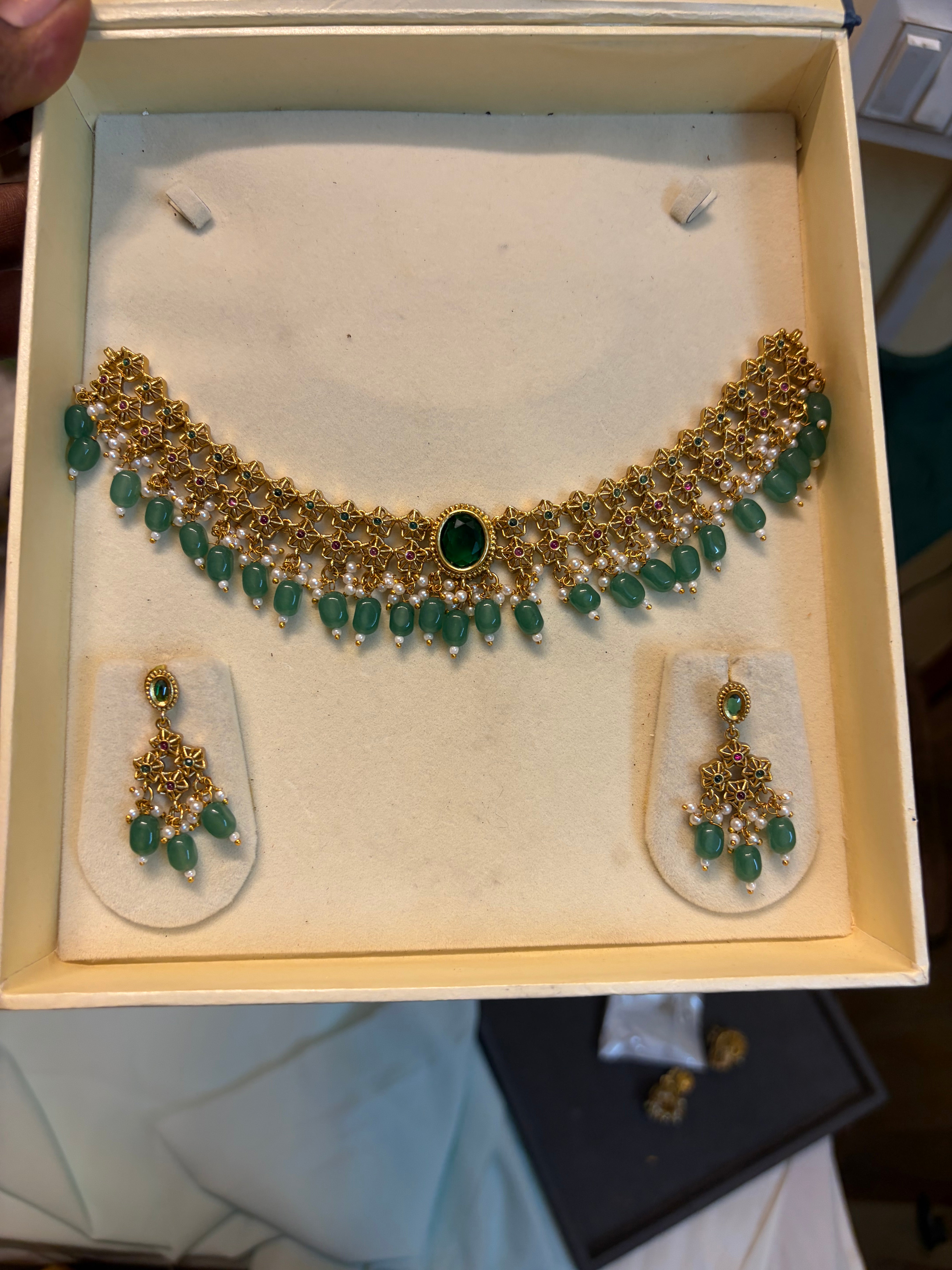 Gold antique finish choker set with strawberry beads accent