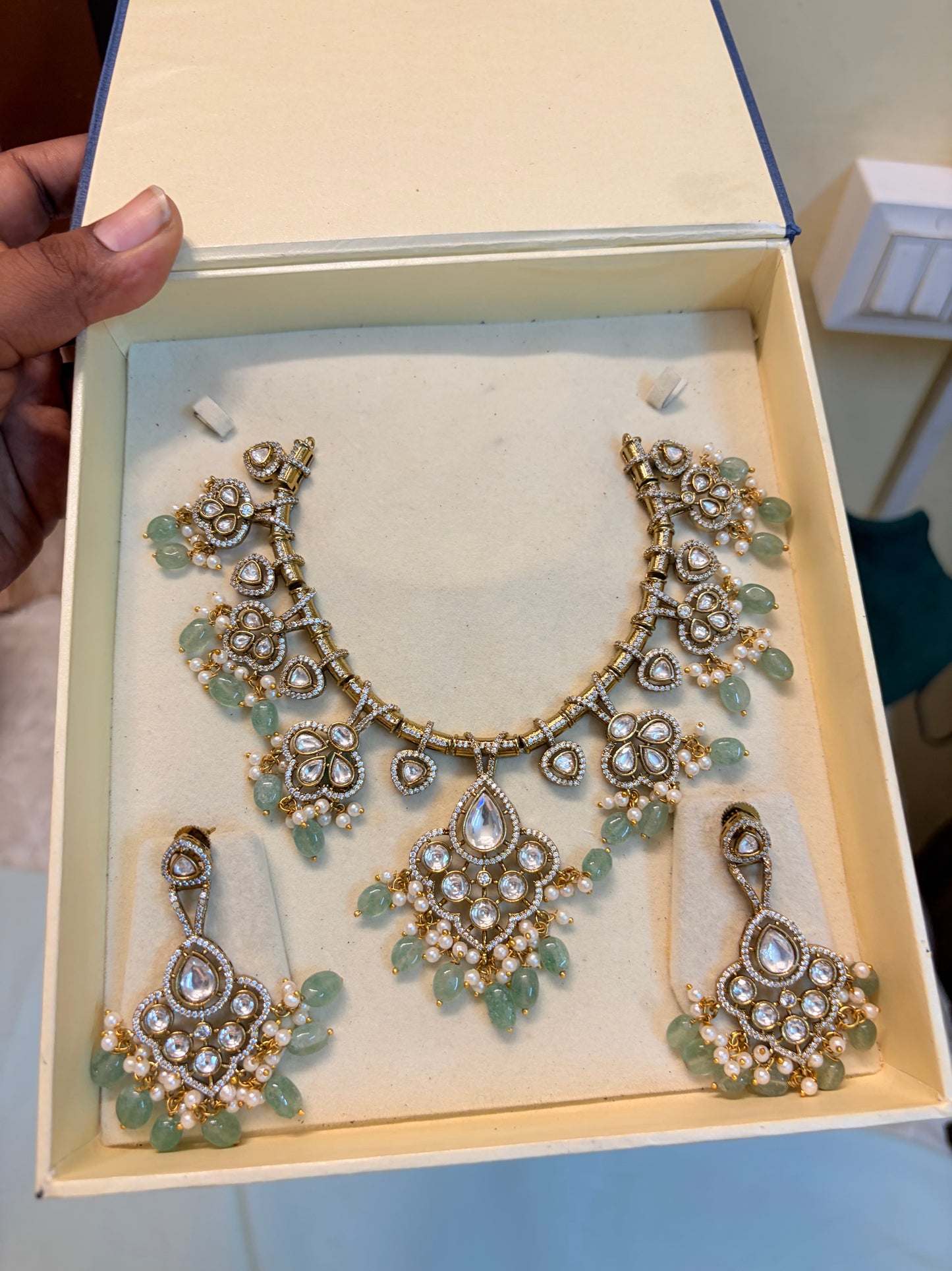 Polki Kundan jadau necklace set with strawberry beads accents