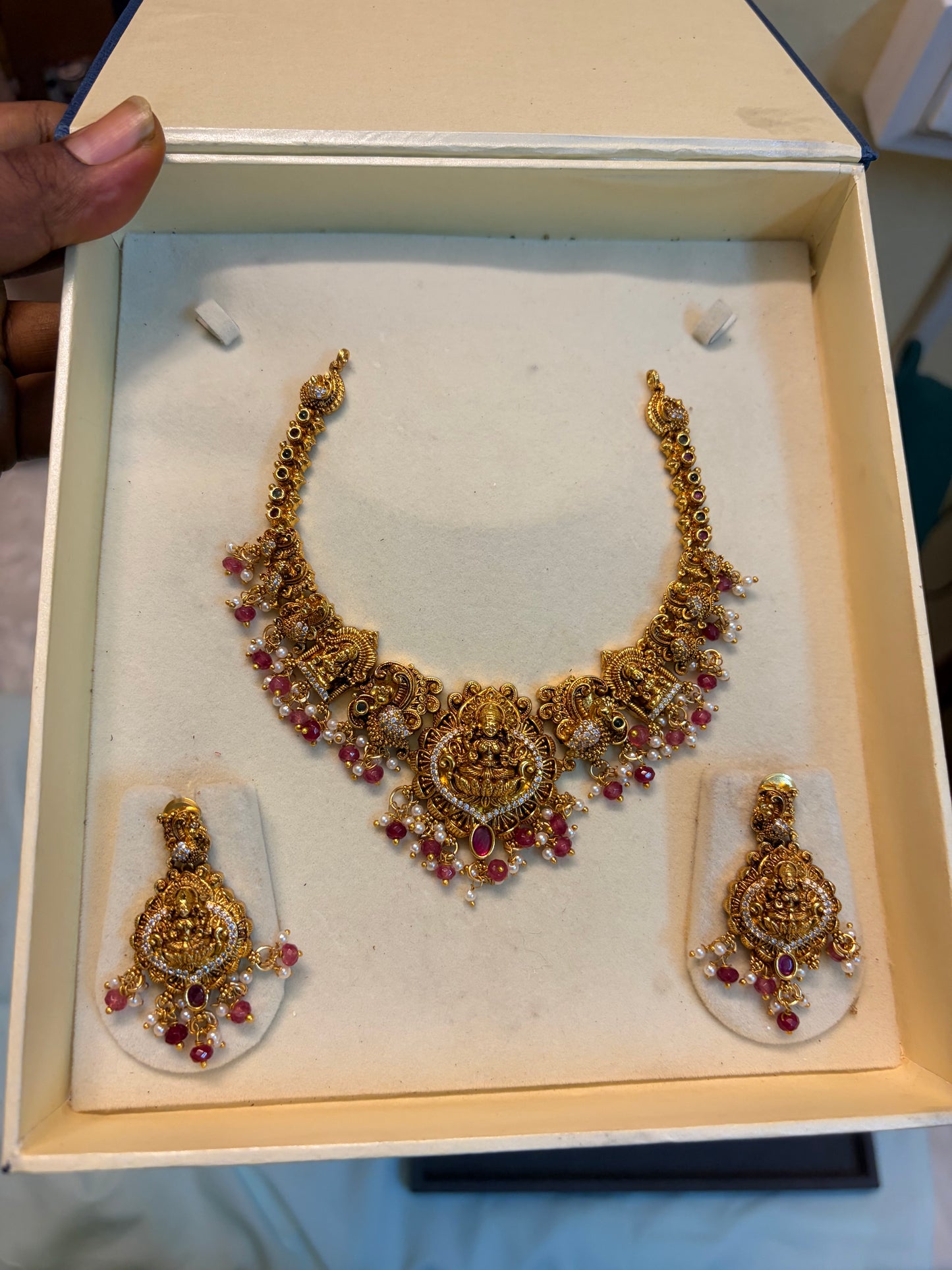 Gold Nakshi jadau necklace set with Ruby beads