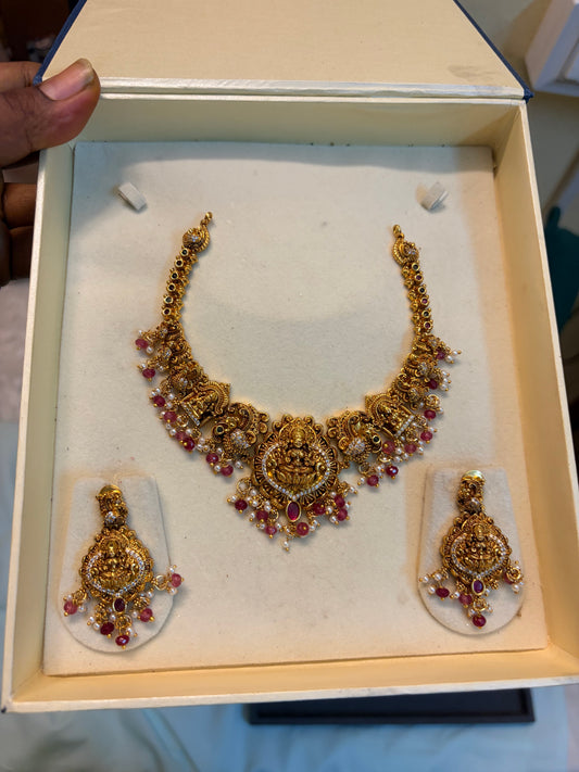 Gold Nakshi jadau necklace set with Ruby beads