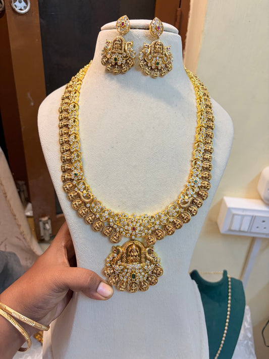 Gold inspired diamond cut jadau Lakshmi coin haram