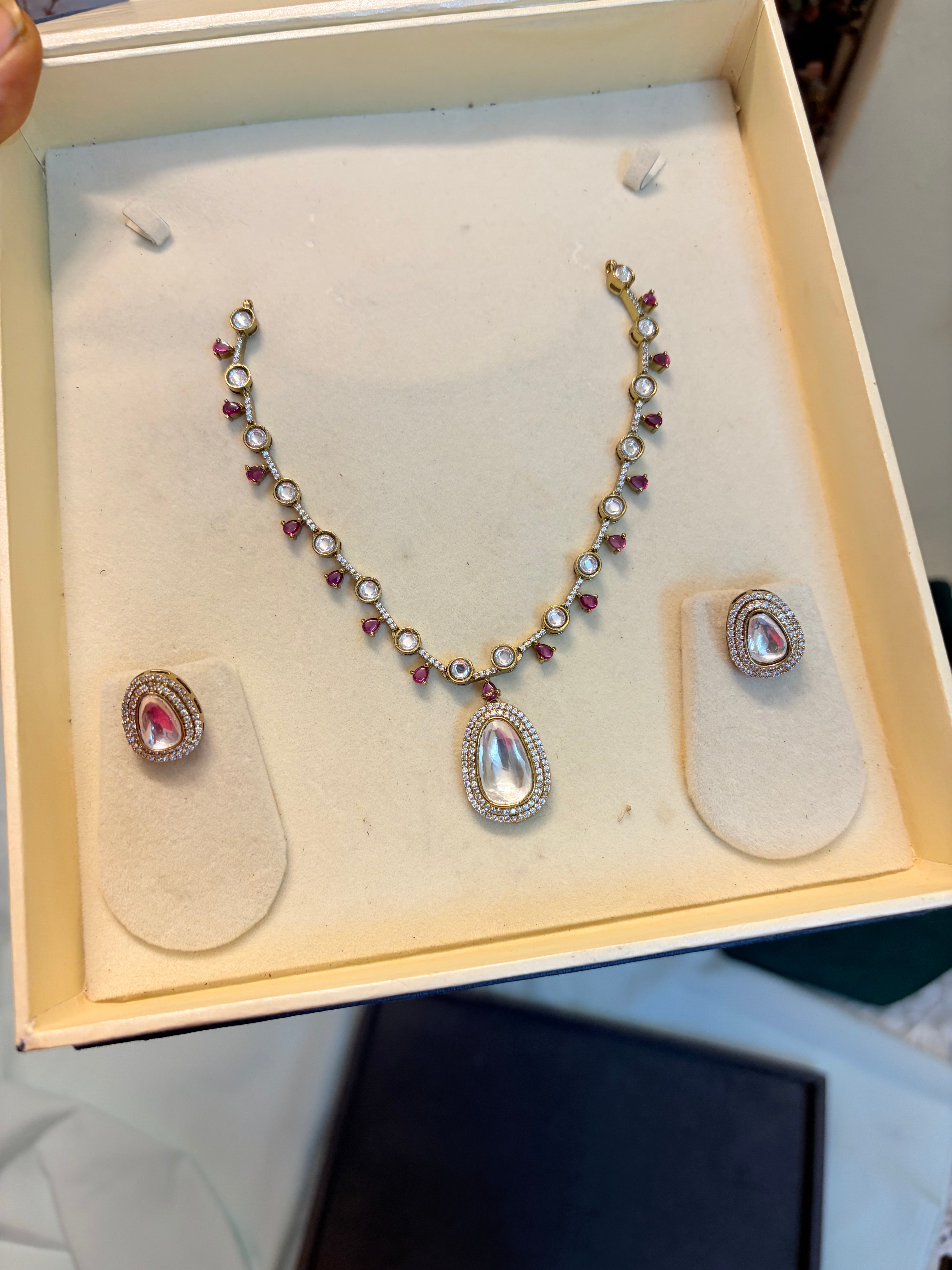 Elegant Kundan Teardrop necklace set with Ruby stone accents