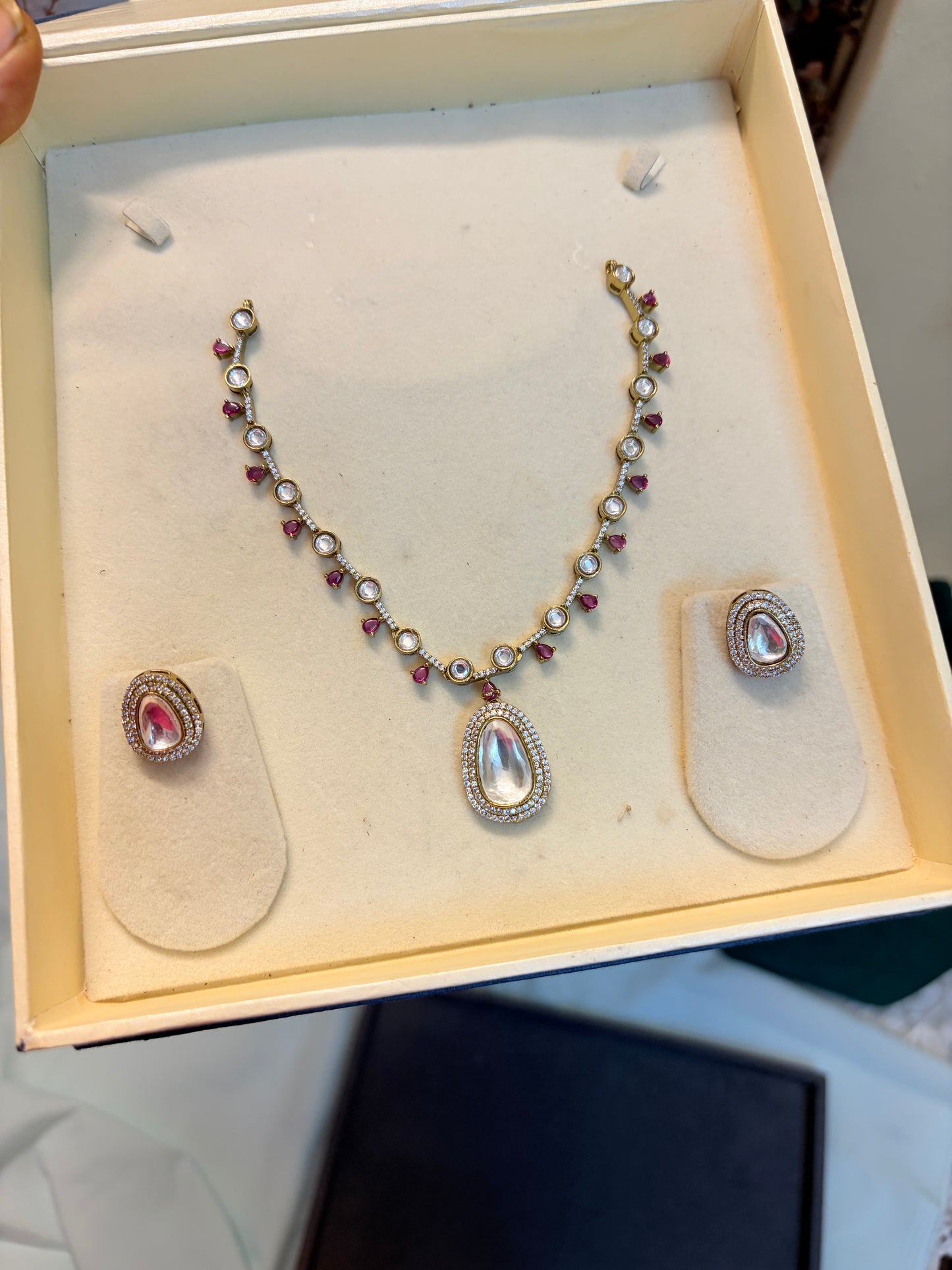Elegant Kundan Teardrop necklace set with Ruby stone accents