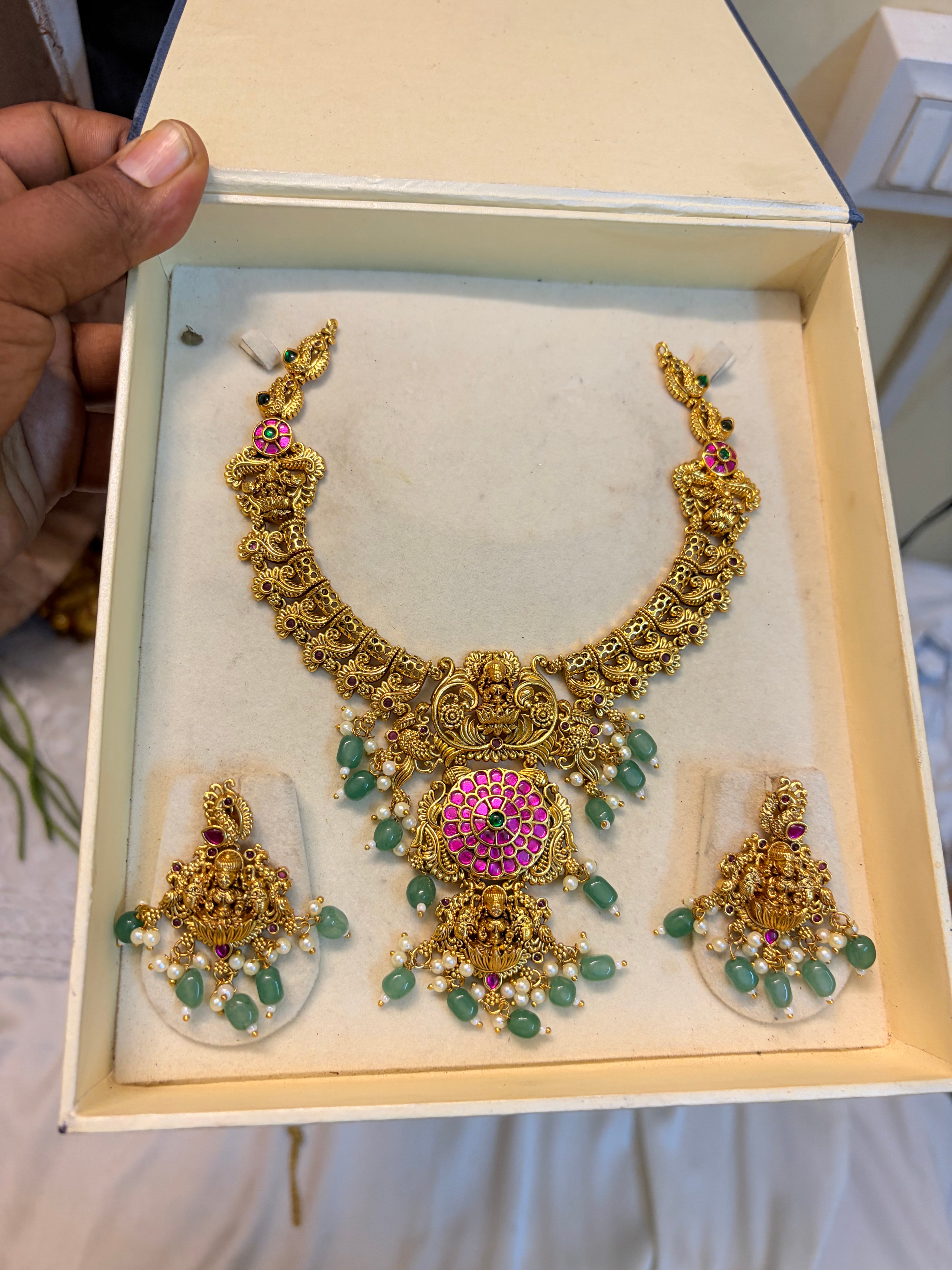 Pure kemp stones jadau Lakshmi motif necklace set