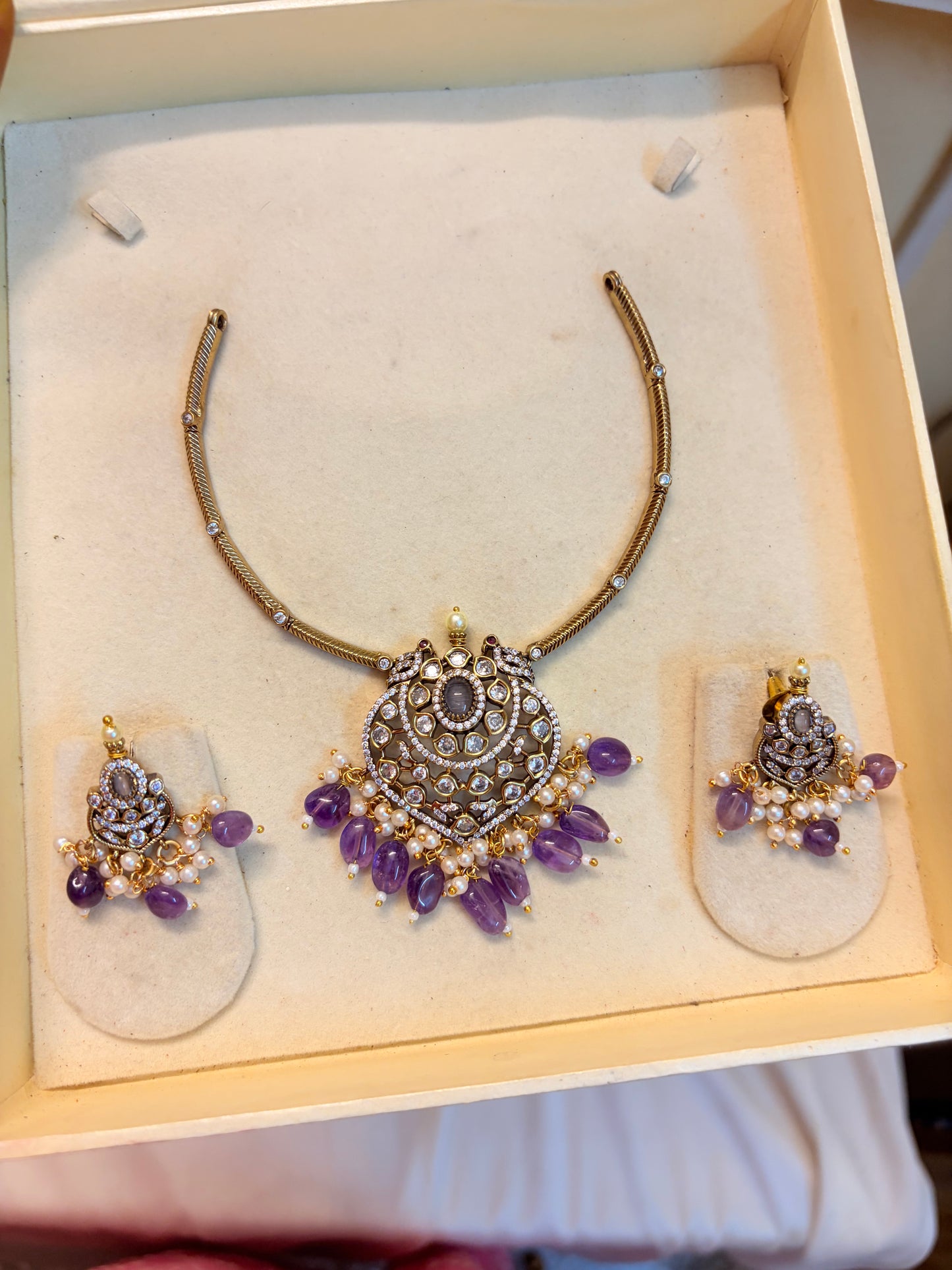 Victoria Kanti necklace set with purple accents