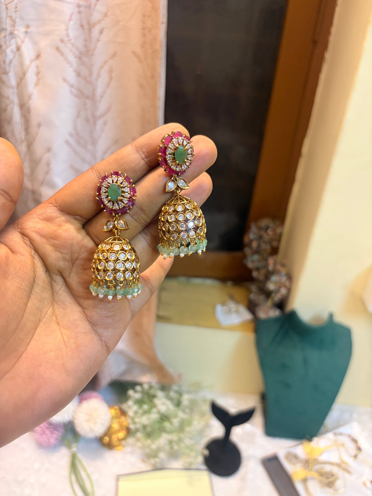 AD stones Multicolour Jhumka with strawberry beads accents