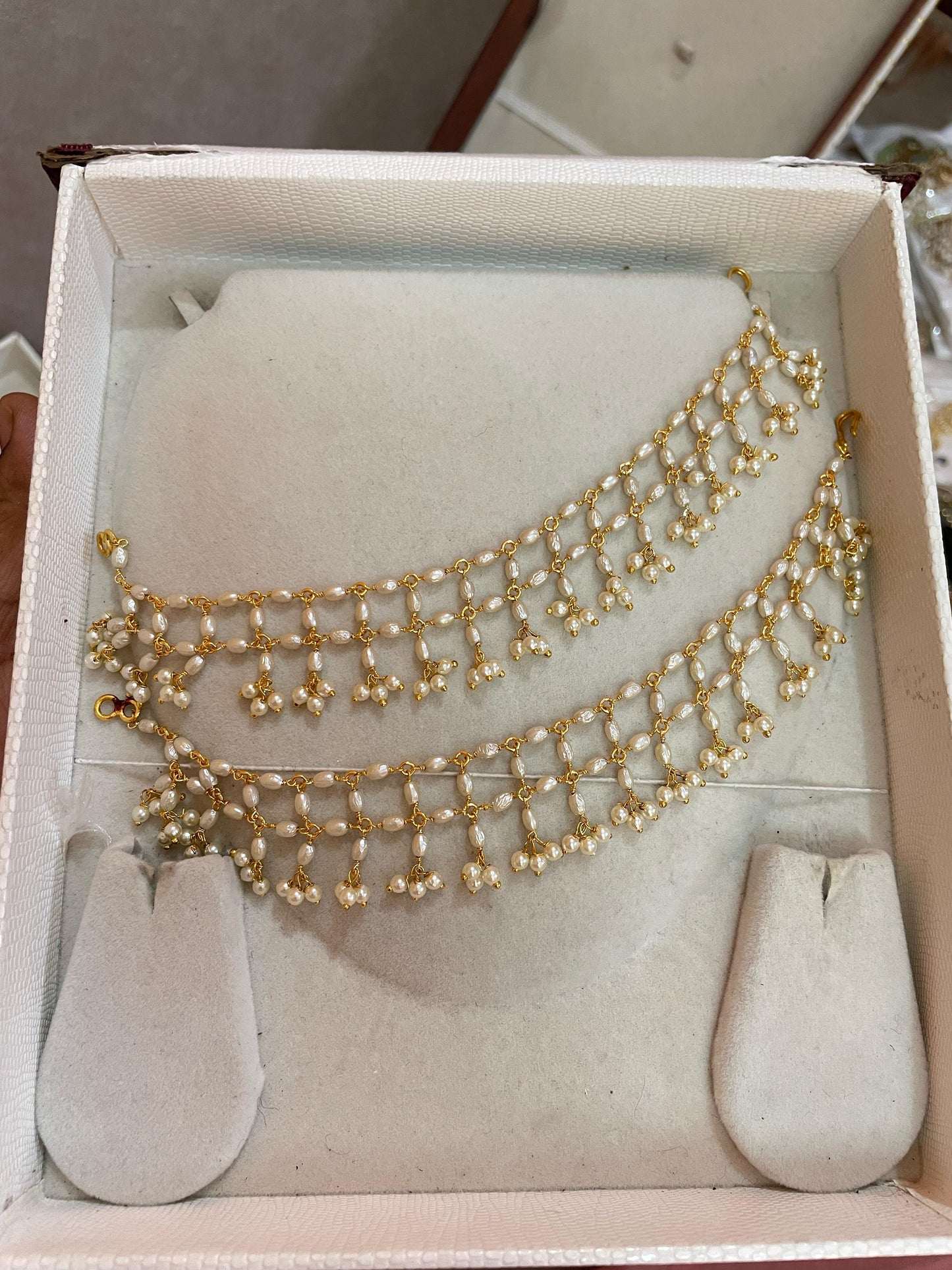 Pearl mattal with gold tone detailing