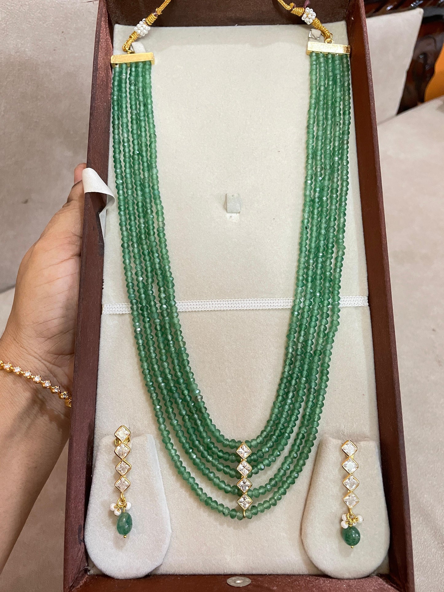 Multi-strand emerald beads haram with diamond cut accents