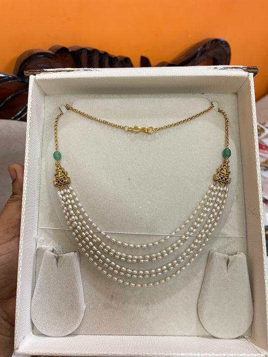 Luminous layer pearl chain with lakshmi motif