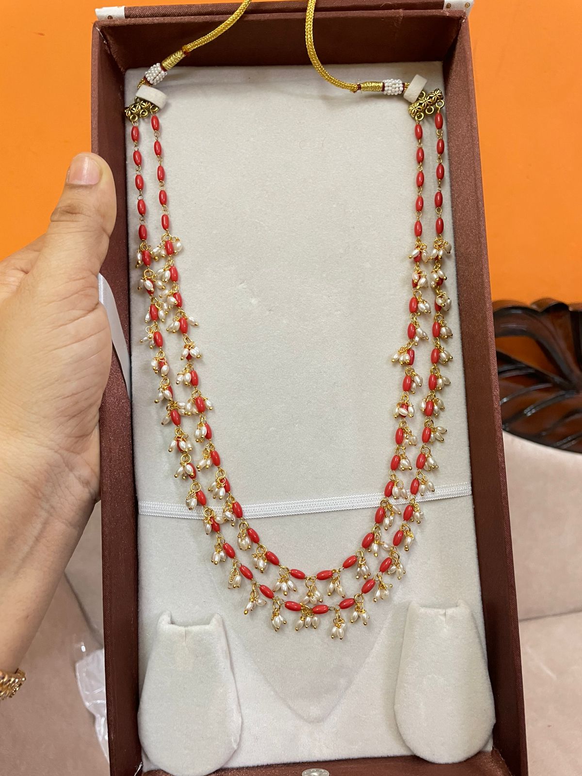 Elegant coral pearl chain