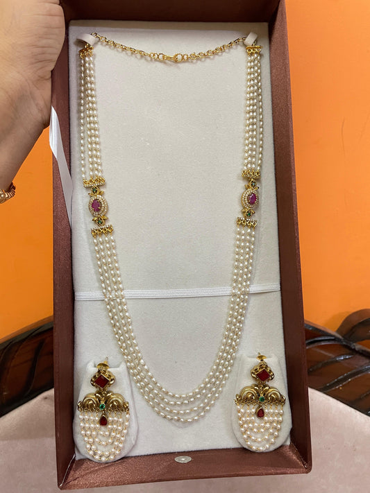 Elegant pearl layer haram with ruby green accents
