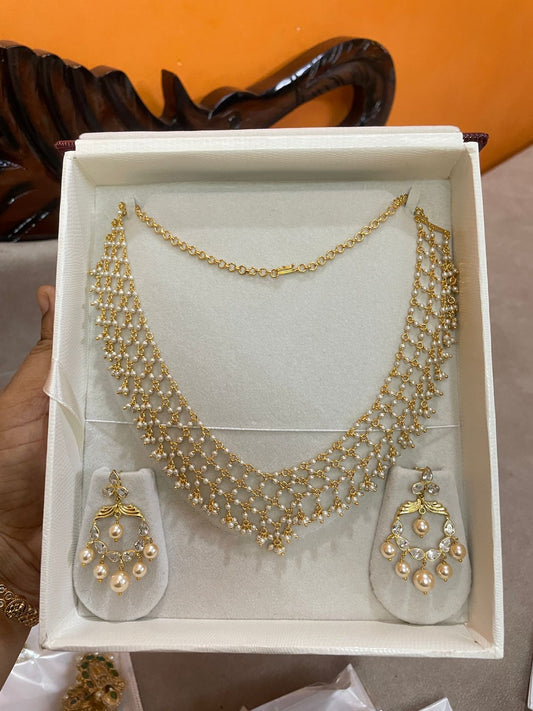 Beautiful pearl zali chain with dangle earrings