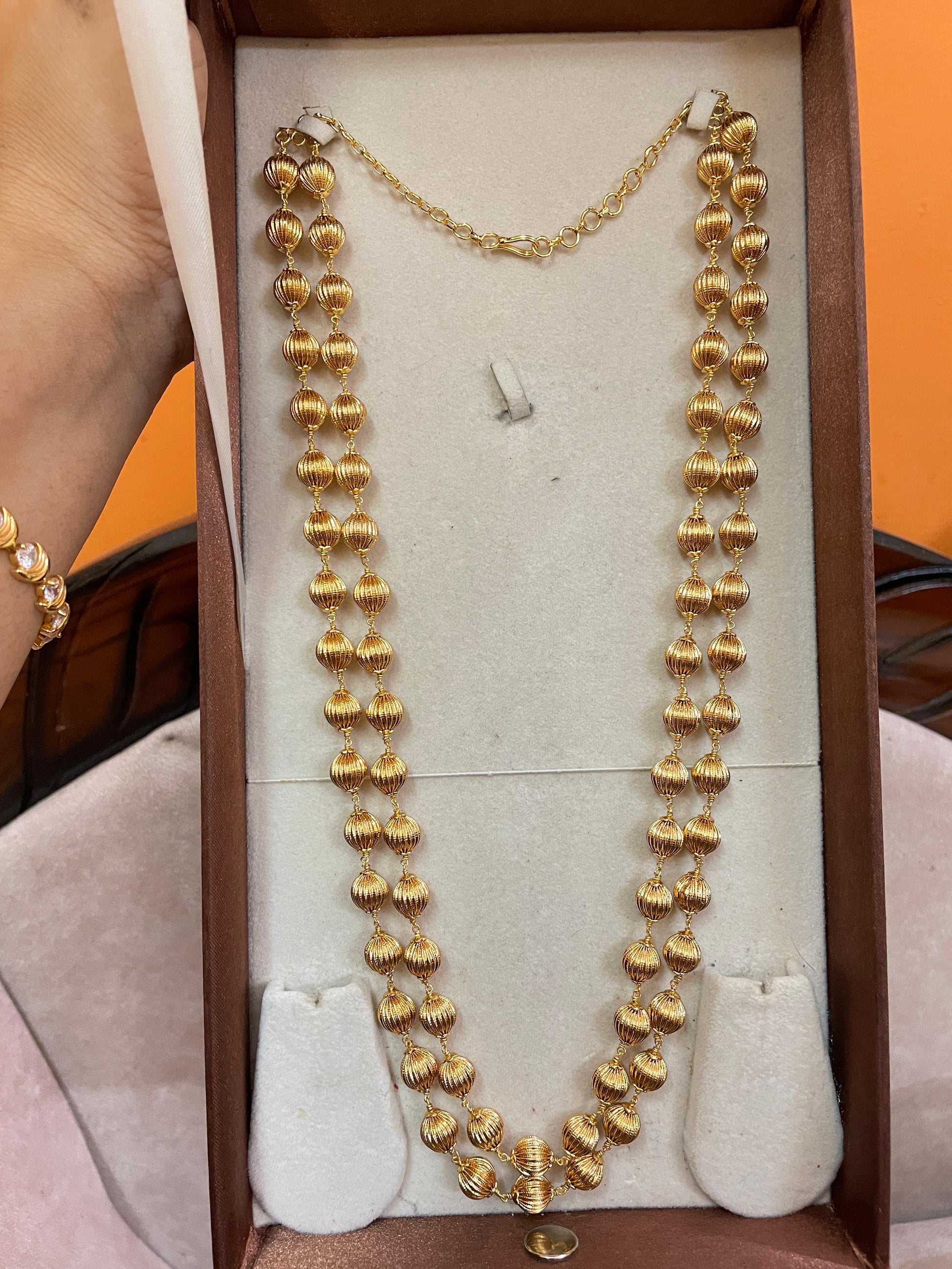 Double layer gold toned nakshi balls haram