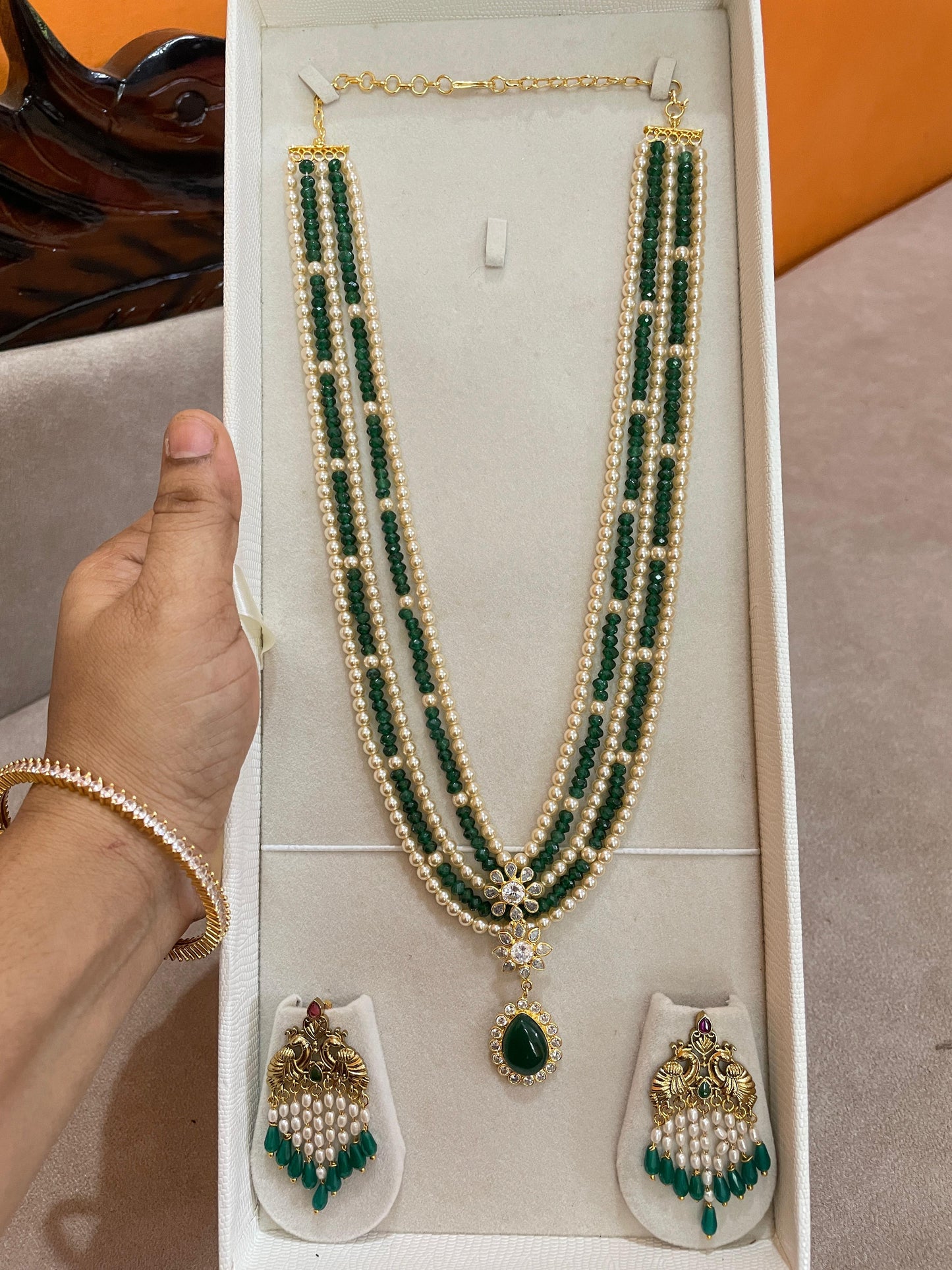 Emerald beaded pearl haram with peacock earrings