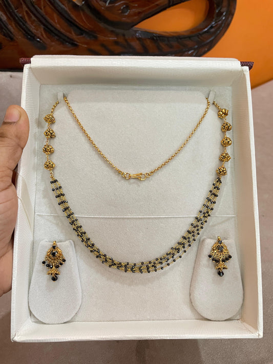 Gold nakshi black beads chain
