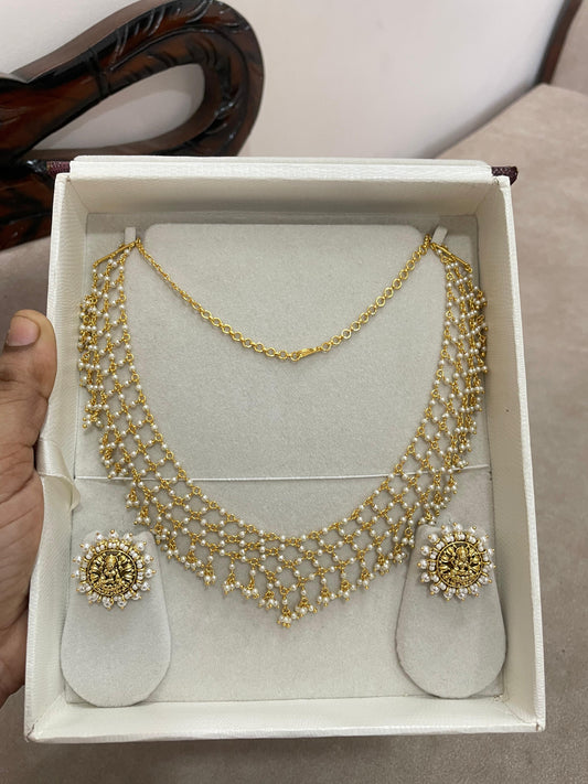 Mesmerizing pearl zali chain with lakshmi stud