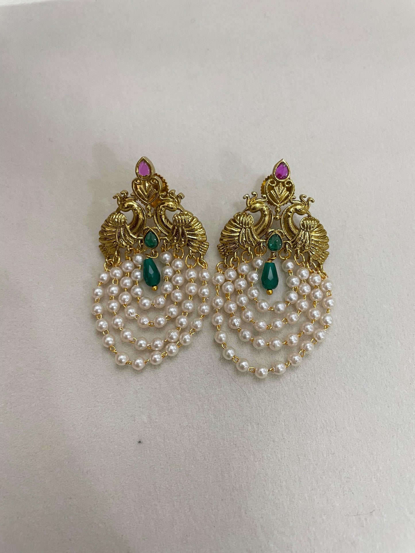 Peacock pearl cascade earrings