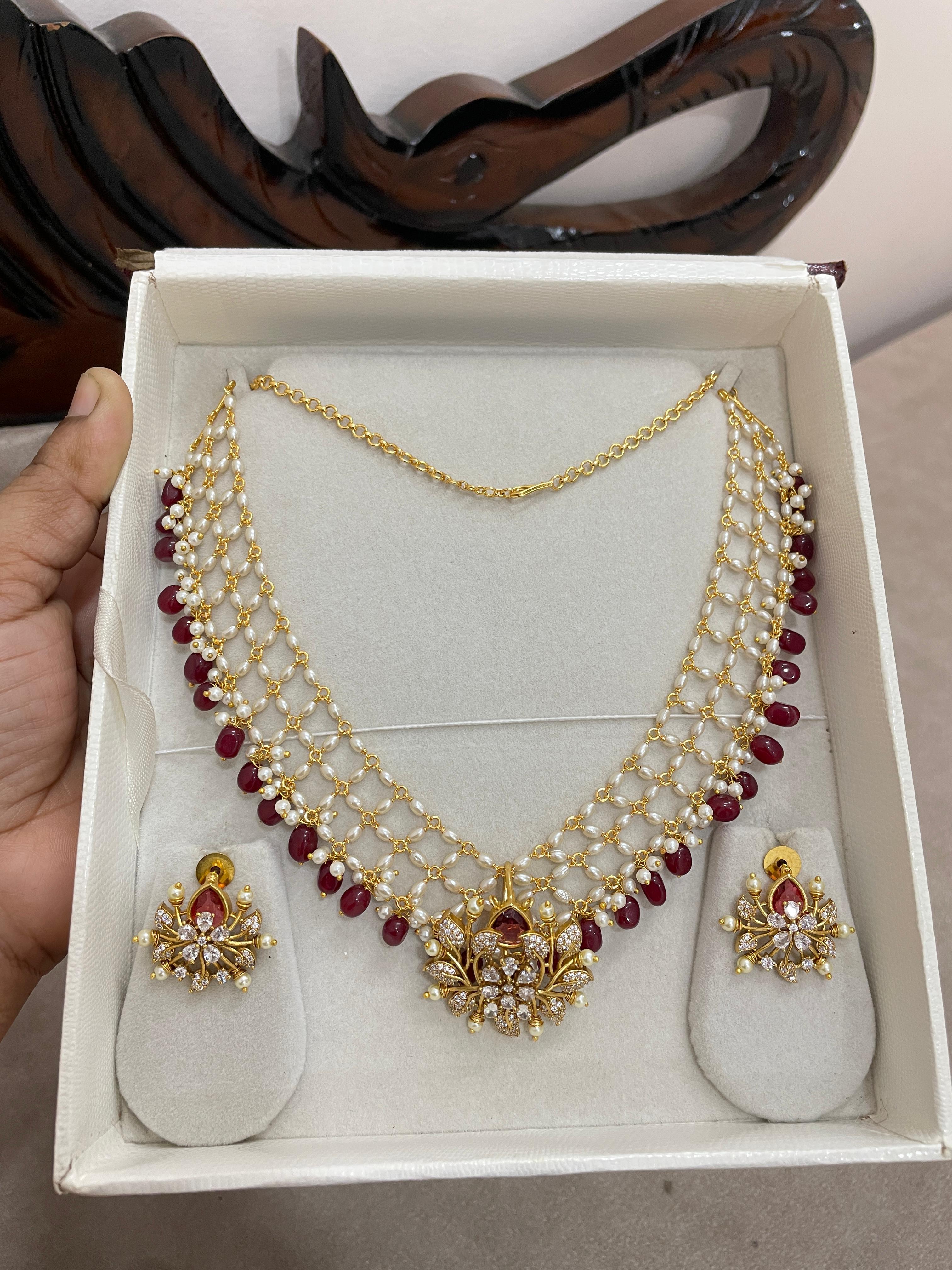 Classic Pearl zali chain with Ruby beads and Cz stone locket