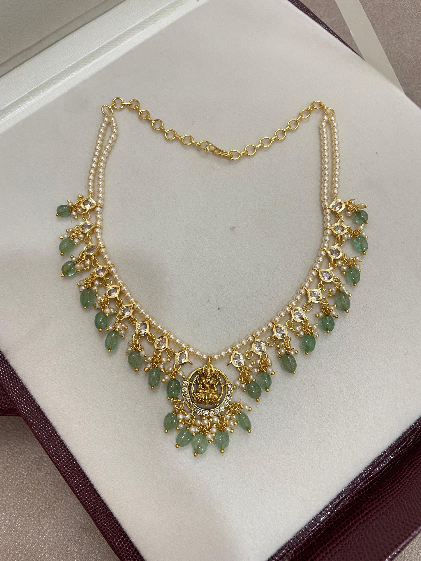 Gold replica Lakshmi pearl necklace