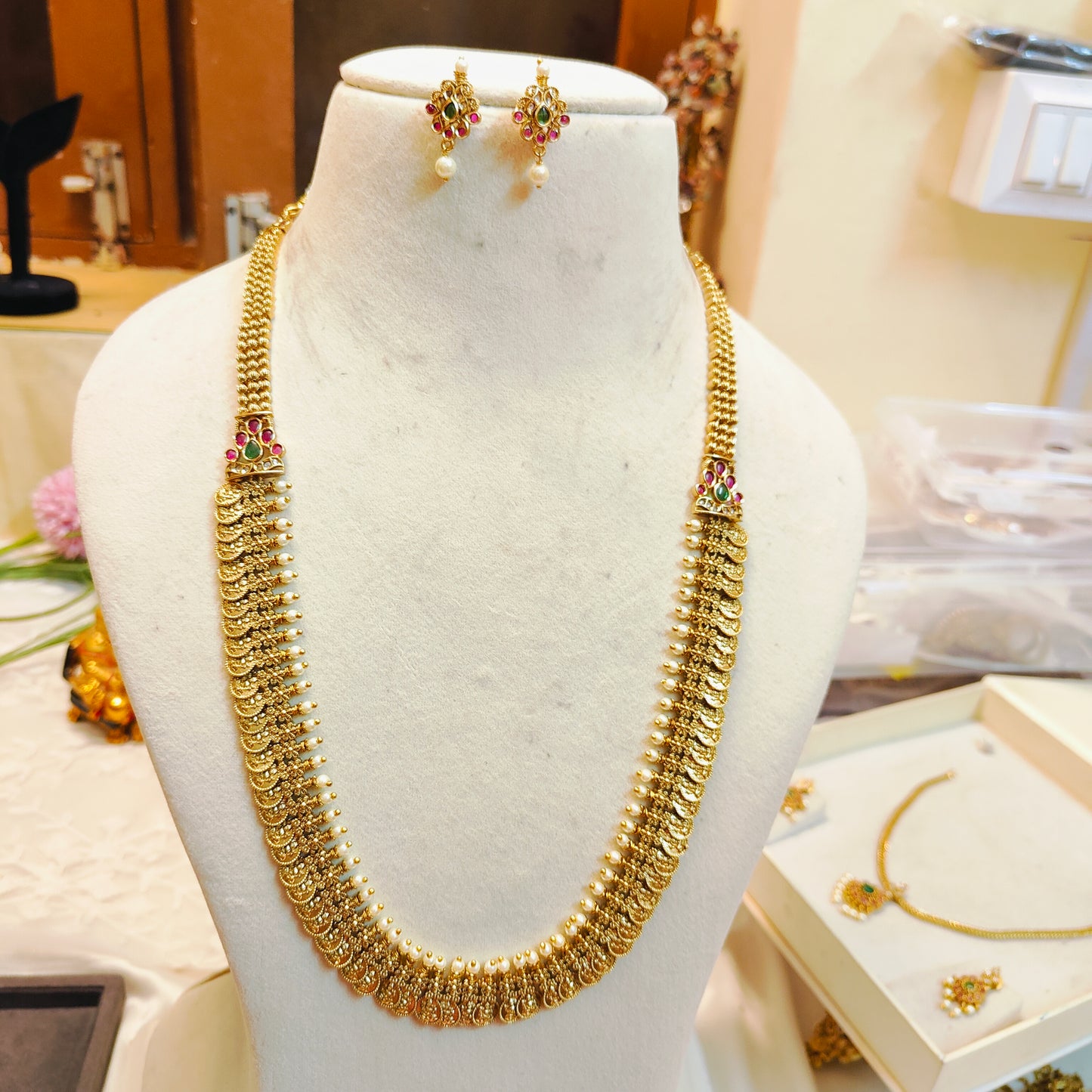 Antique lakshmi coin haram with ruby accents