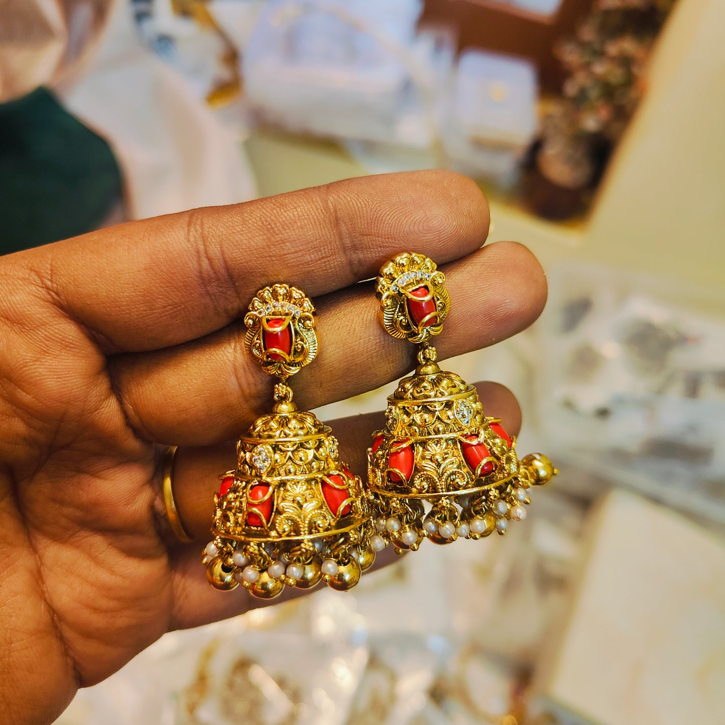 Gold antique finish pagadam jhumka with gold balls