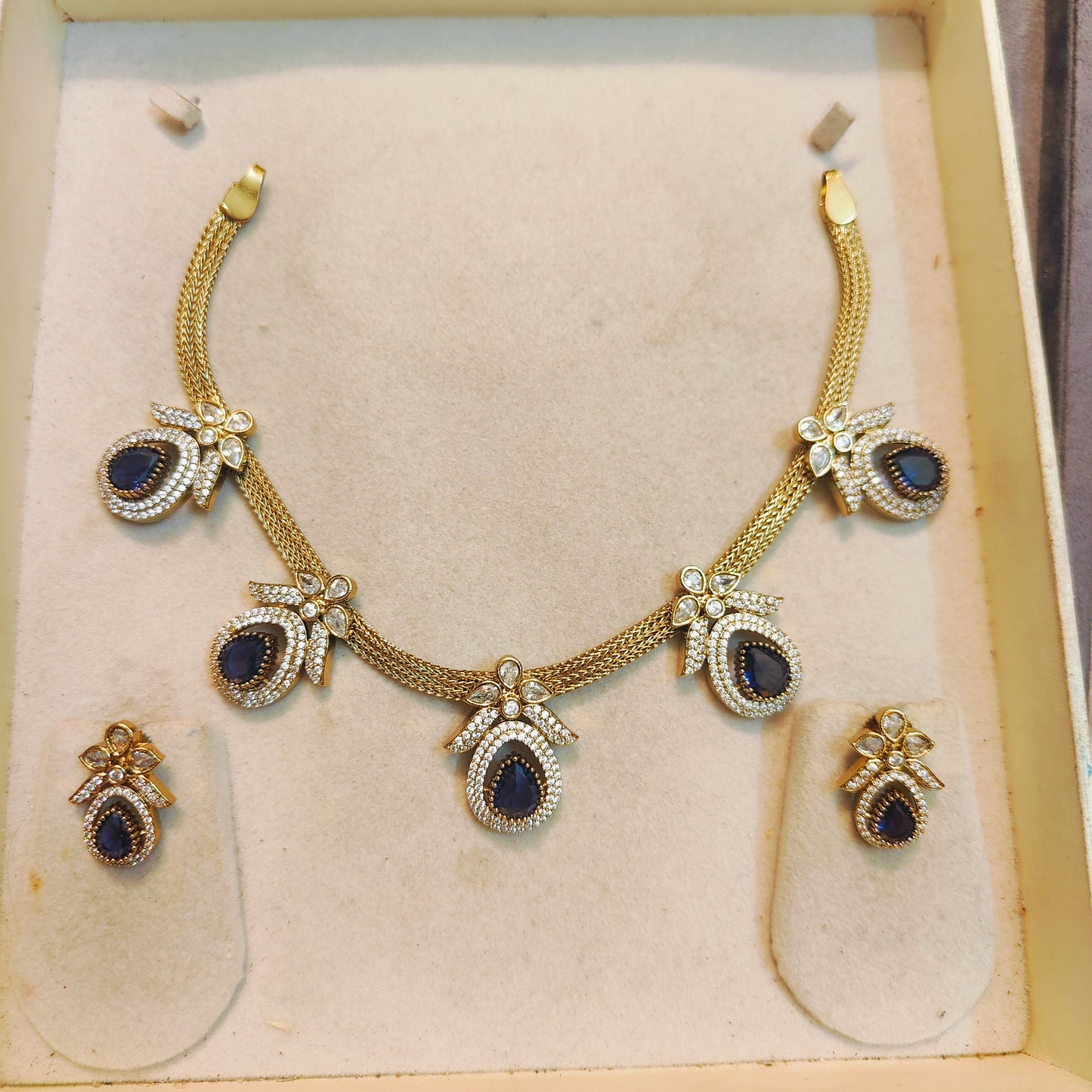 Gold plated neckset with sapphire blue & crystal accents