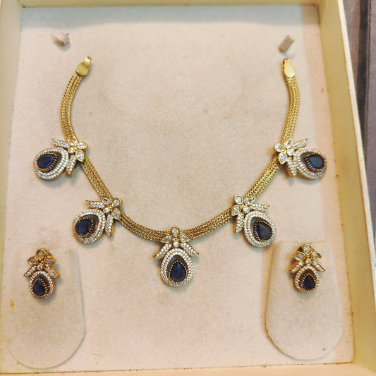 Gold plated neckset with sapphire blue & crystal accents