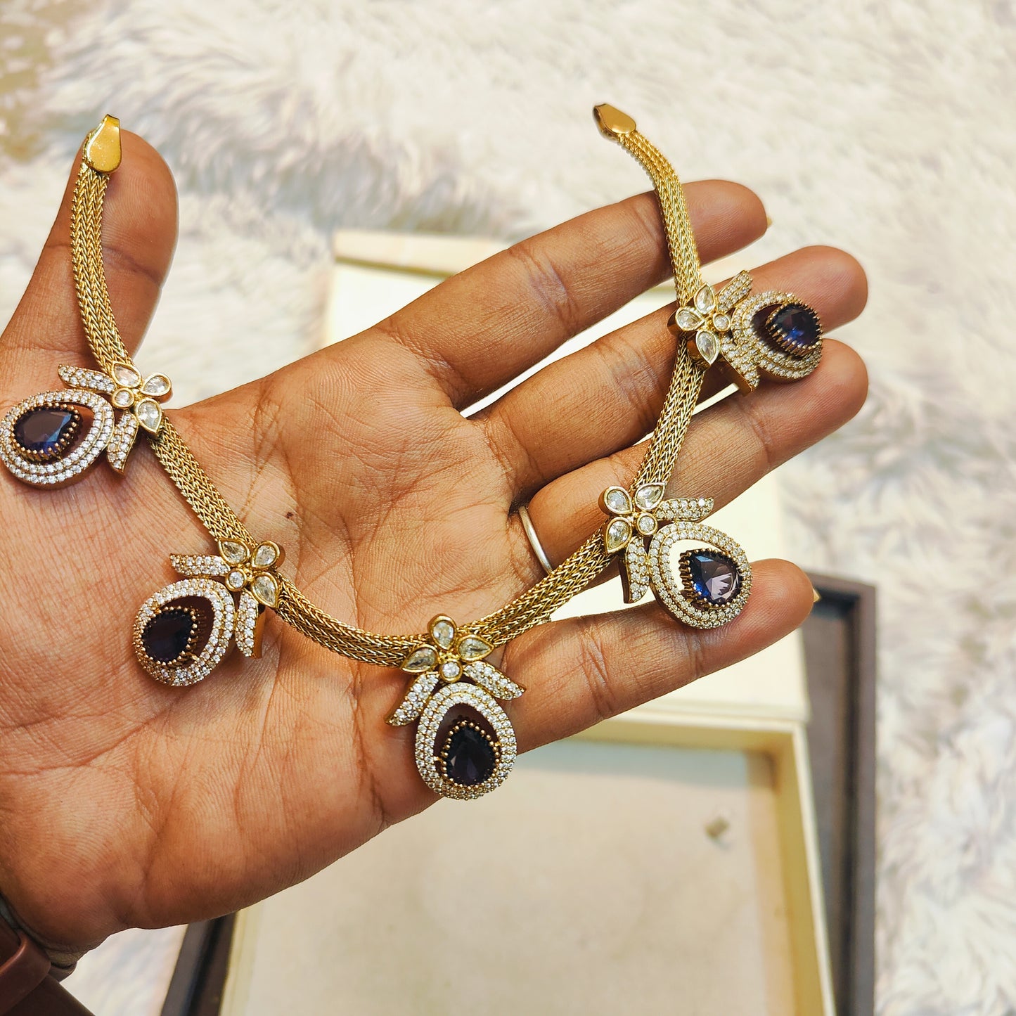 Gold plated neckset with sapphire blue & crystal accents