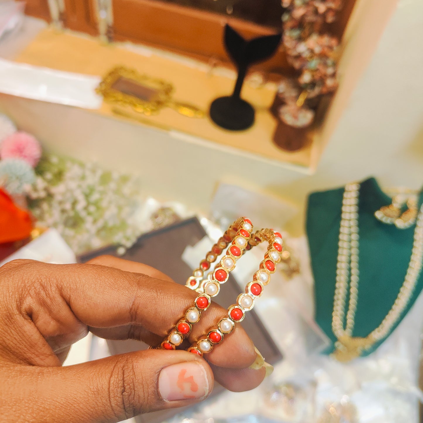 Traditional coral pearl bangles