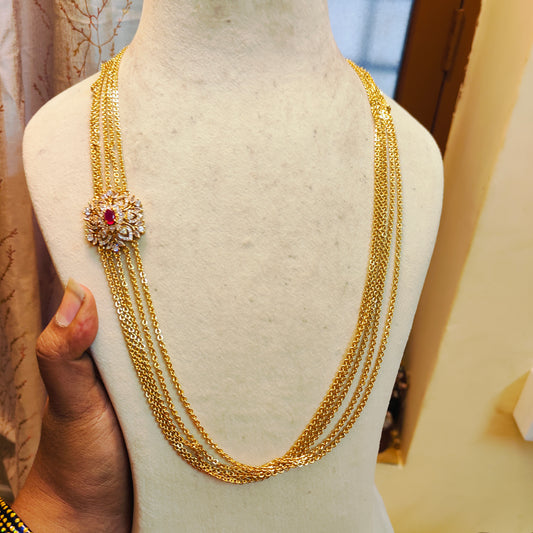 Multi layer gold plated chandraharam with ruby floral pendant 24inches