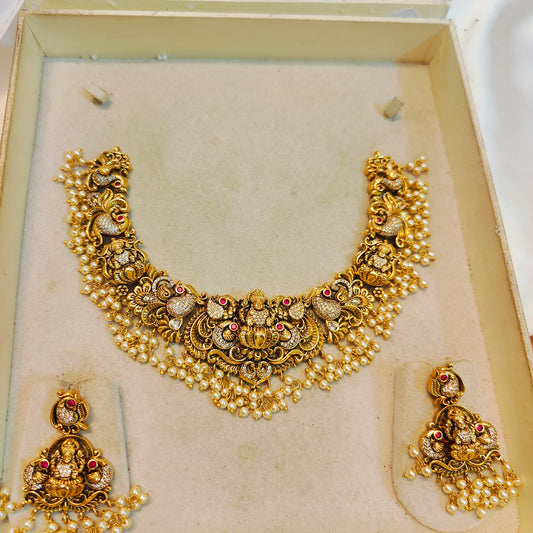 Heritage inspired gold lakshmi necklace set